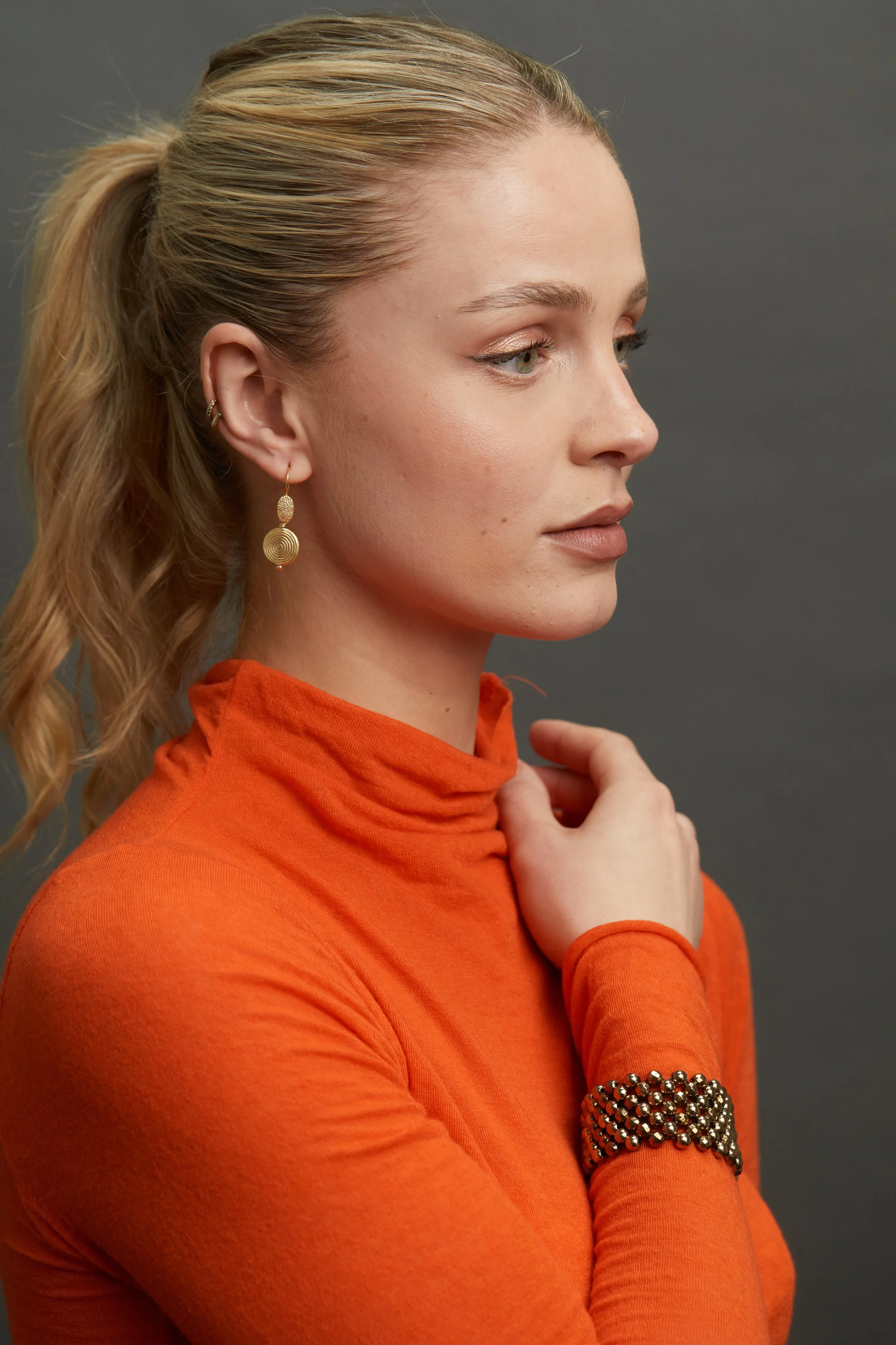 Gold Disc Drop Er and Gold Pyrite Cuff on model 3.jpg