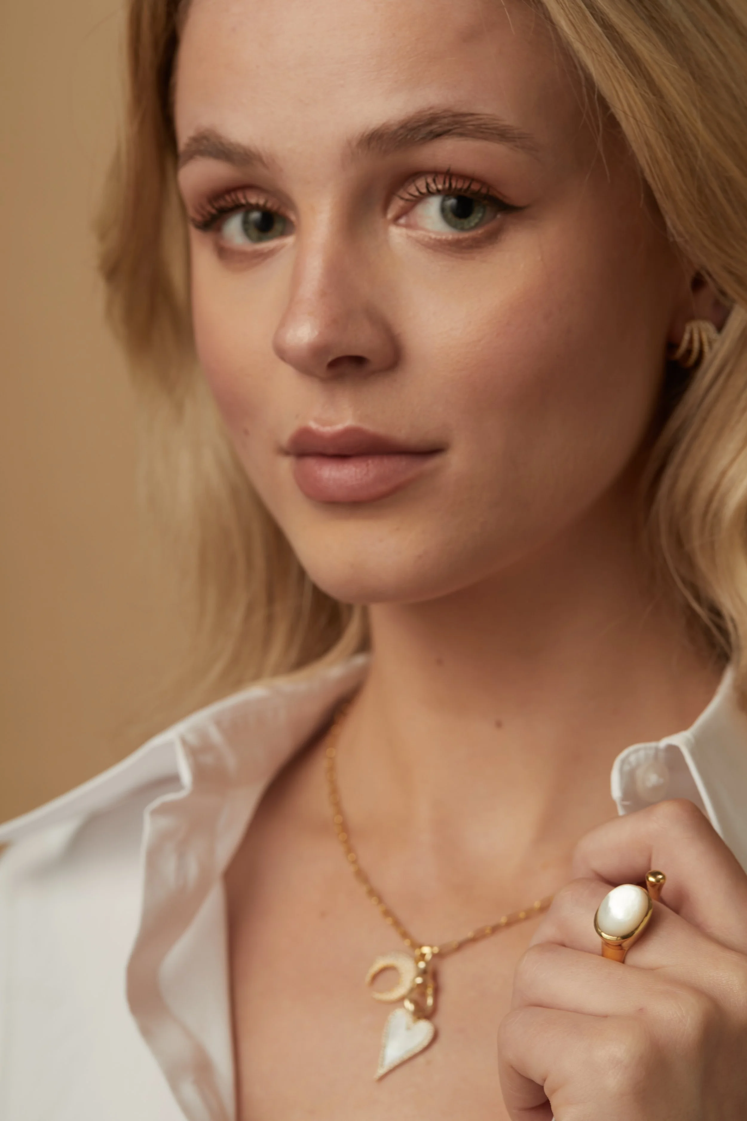 moonstone and Pink Topaz Ring on model.jpg