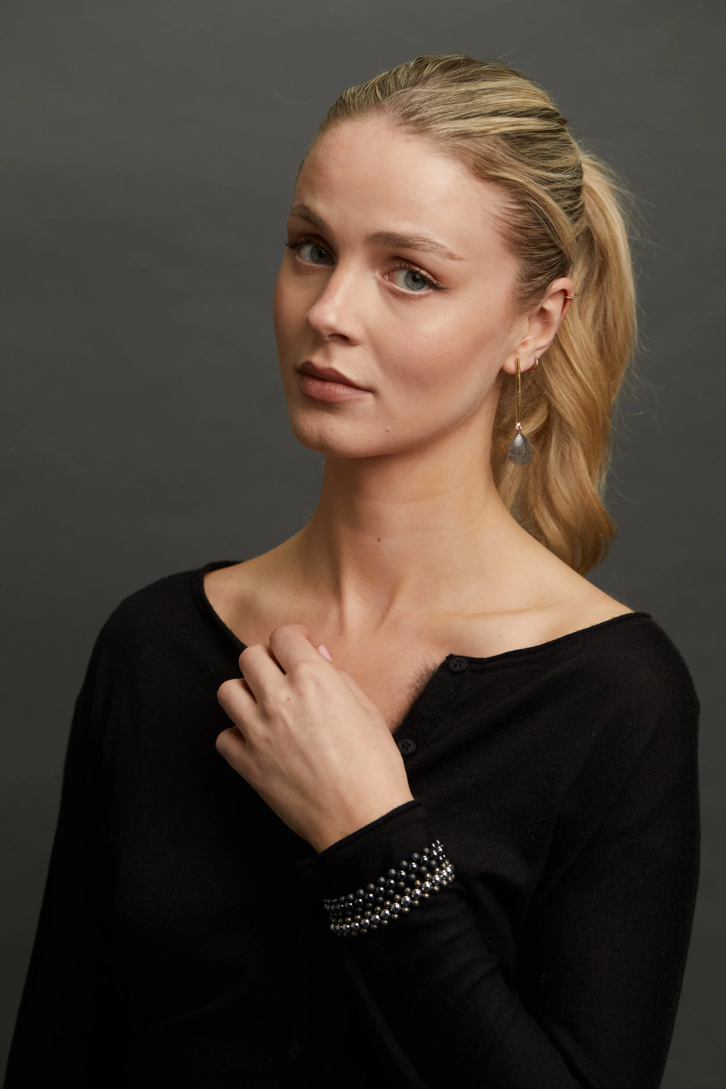 Mini Zip Metallic cuffs on model head tilt.jpg