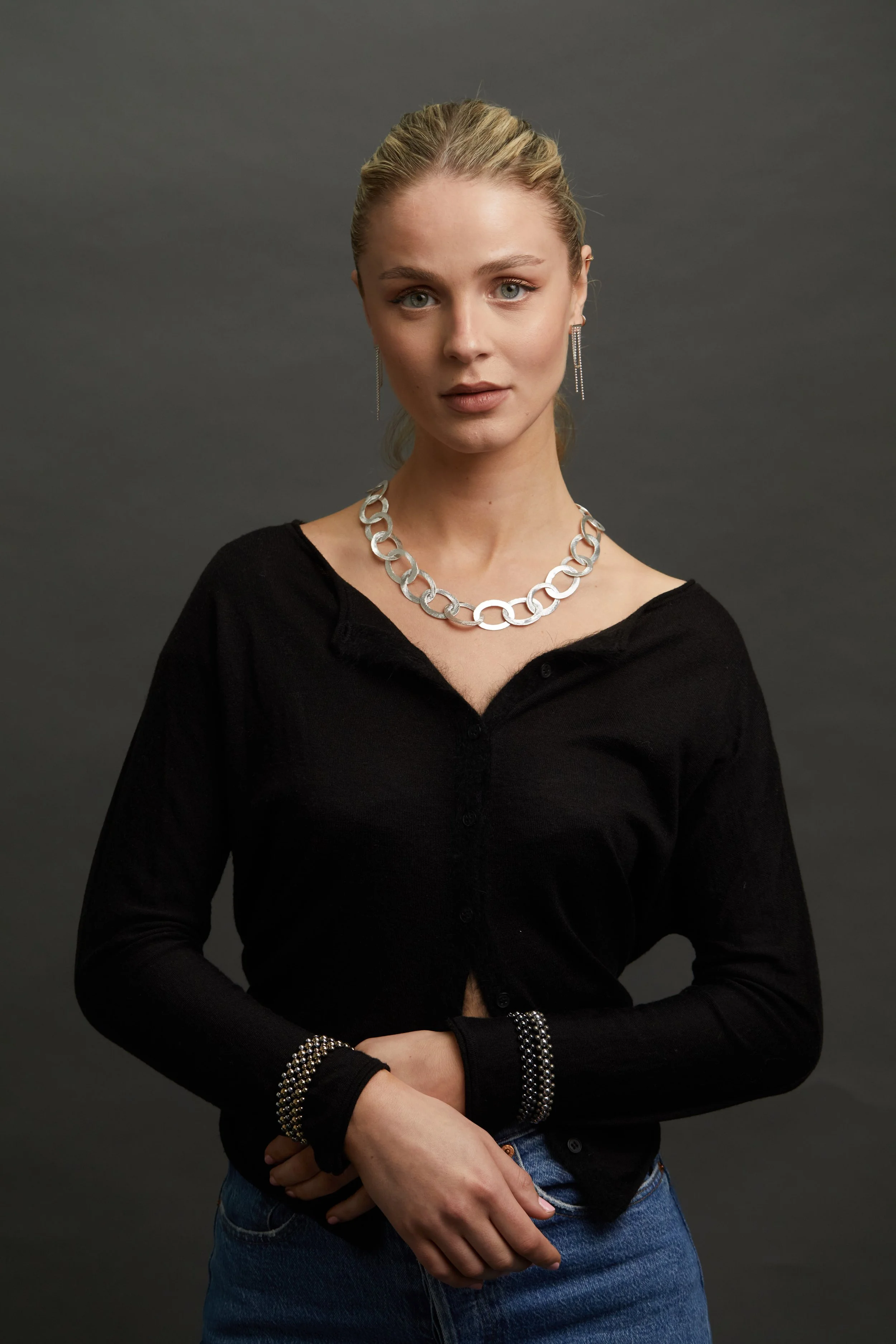 Silver Heavy Oval Link NK on model and mini zip cuff.jpg