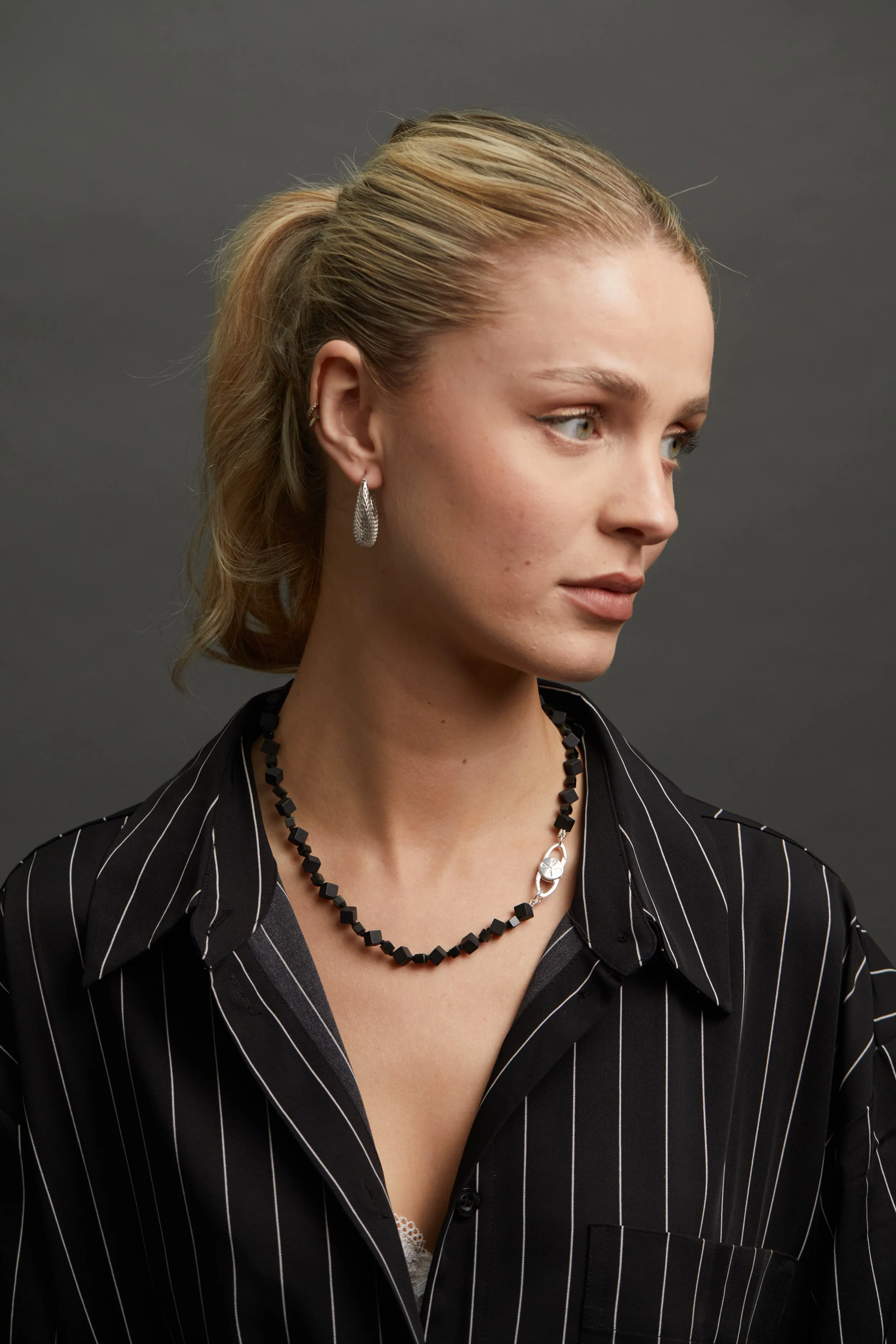 Mini Cube NK in Onyx and Mesh ER side view.jpg