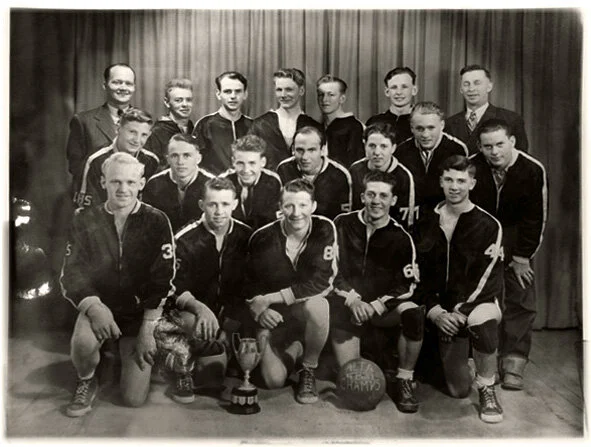 1948-1949 High School Basketball 'B' Boys Division Champions - Cardston Golden Ghosts. 
Back row: Cal Merkley (Principal), Jim Carson, Bryce Forsyth, Veryle Leavitt, Kay Wood, Alex Elder, Orzie Steed (Coach).
Middle Row: Morgan Beazer, Dale Nish, Bil
