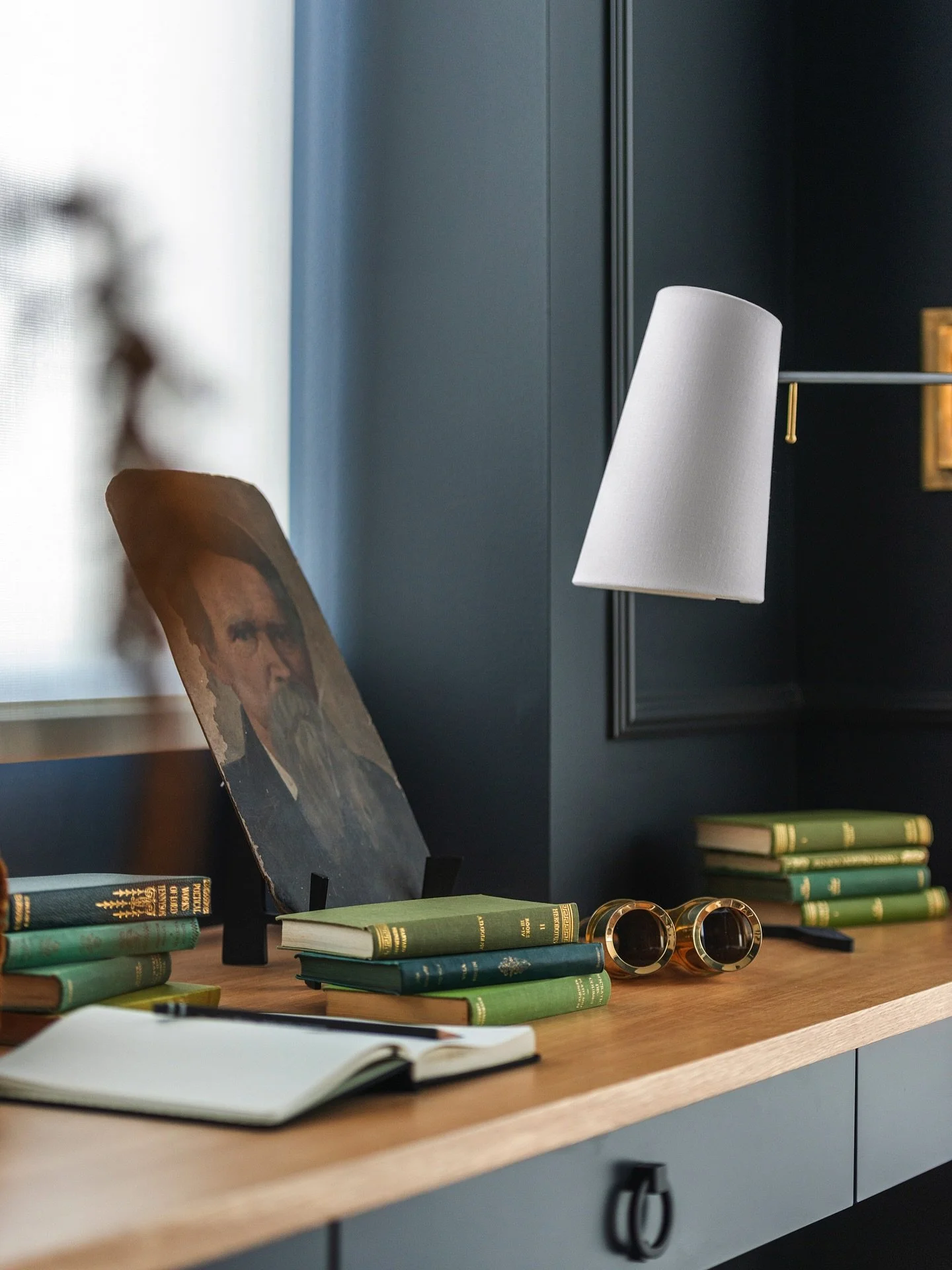 This home office had a lot of angles and places, so instead of fighting them, we leaned in. The applied molding adds just enough structure and painted all one color to keep it moody &amp; cohesive with the rest of the home. These small details can ma
