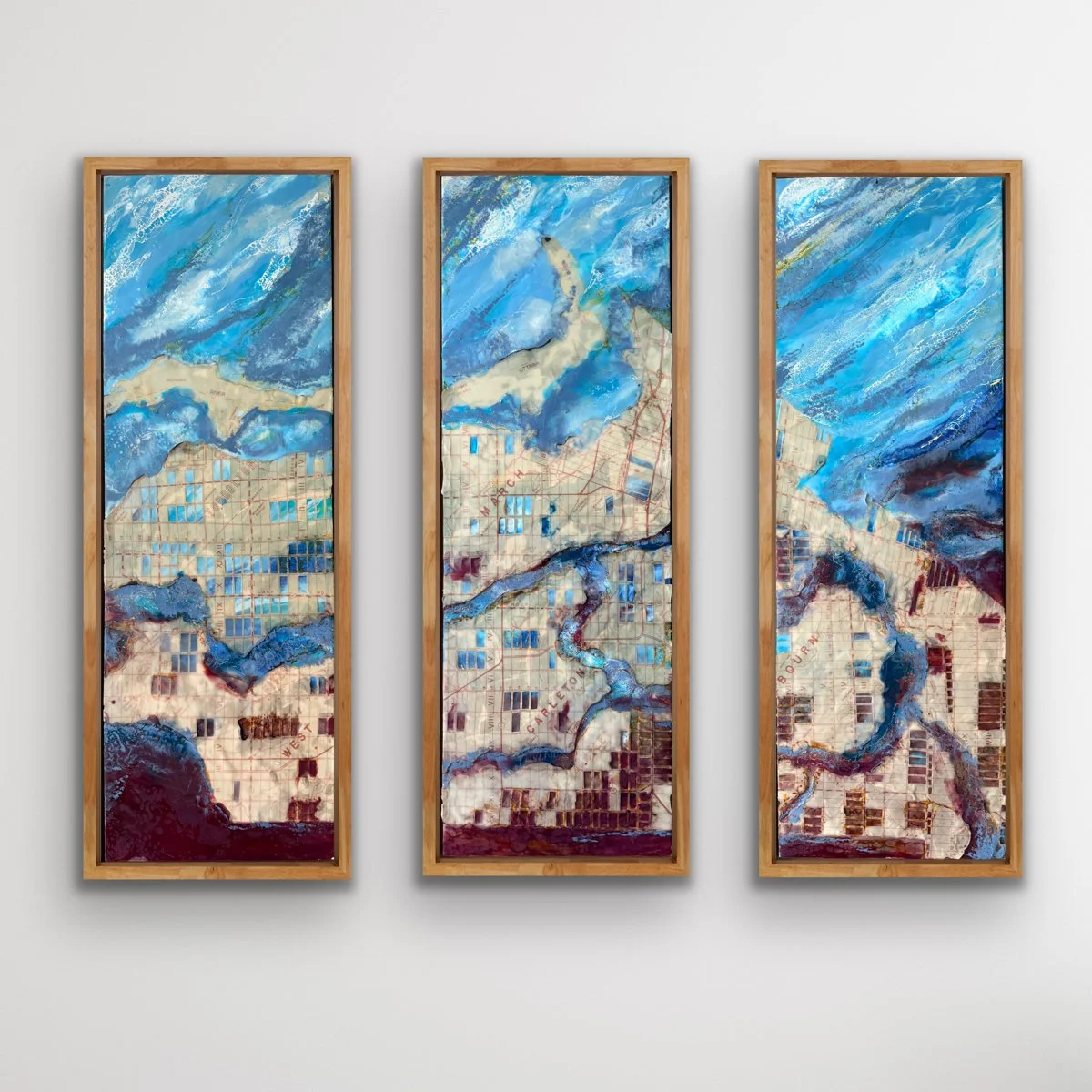 Full view of River Logic an original three-panel encaustic painting with vintage map lines and blue abstract river movement.