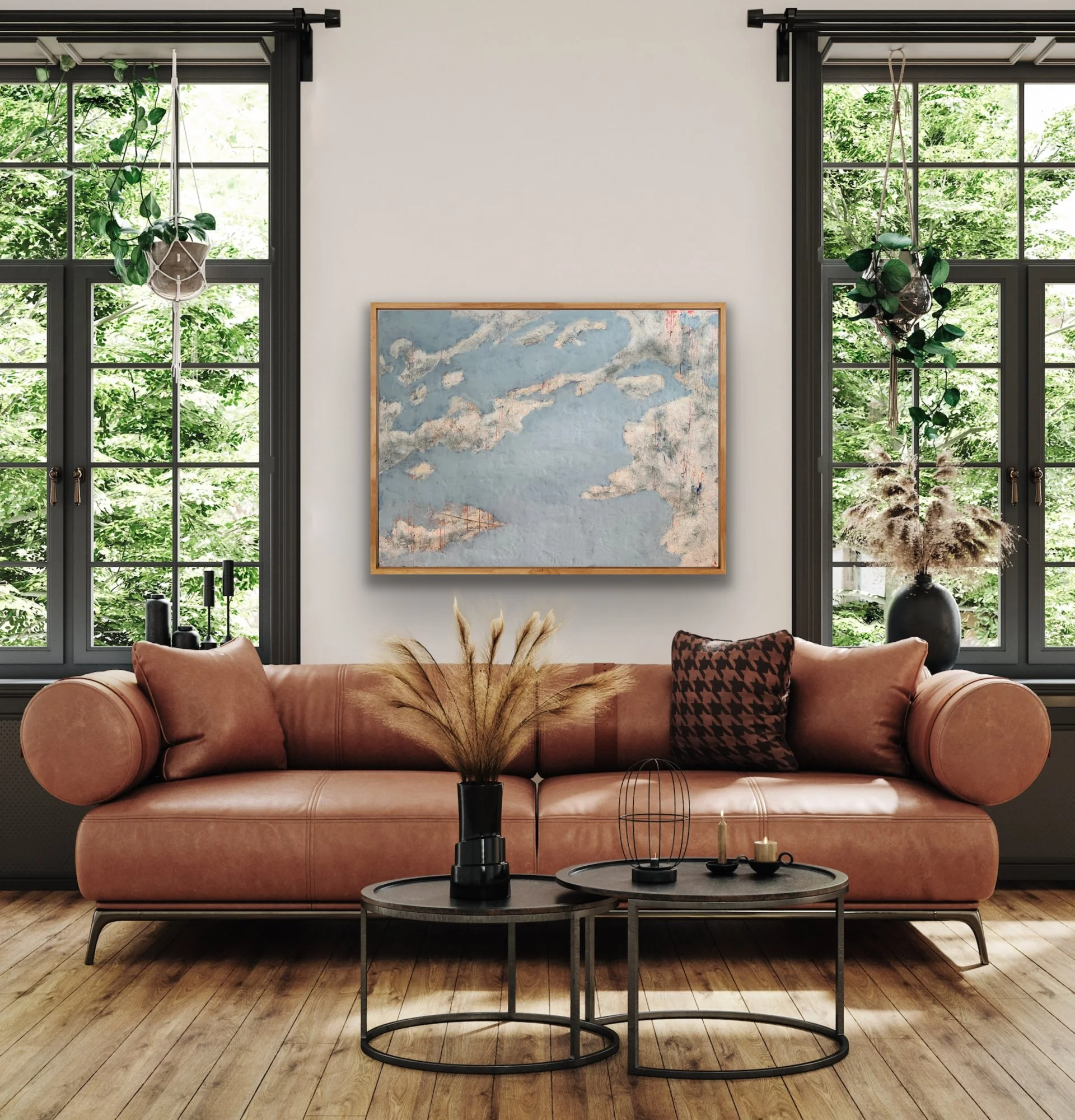 Cloud Drift Atlas original encaustic abstract landscape painting above a leather sofa in a modern living room with large windows, natural wood floors, and warm contemporary decor.