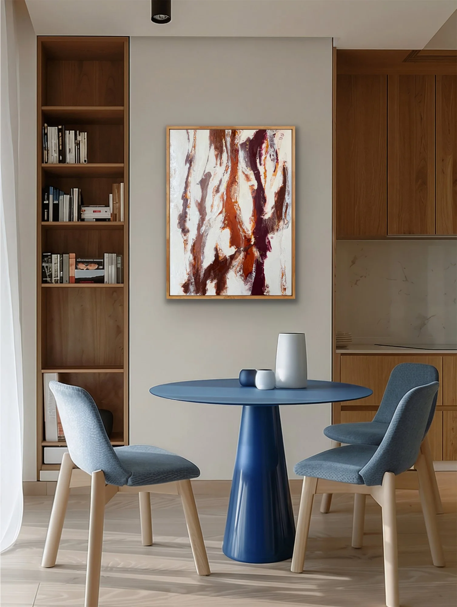 Original encaustic abstract painting Earth Memory shown in a modern dining space with warm wood tones and a neutral pine frame.