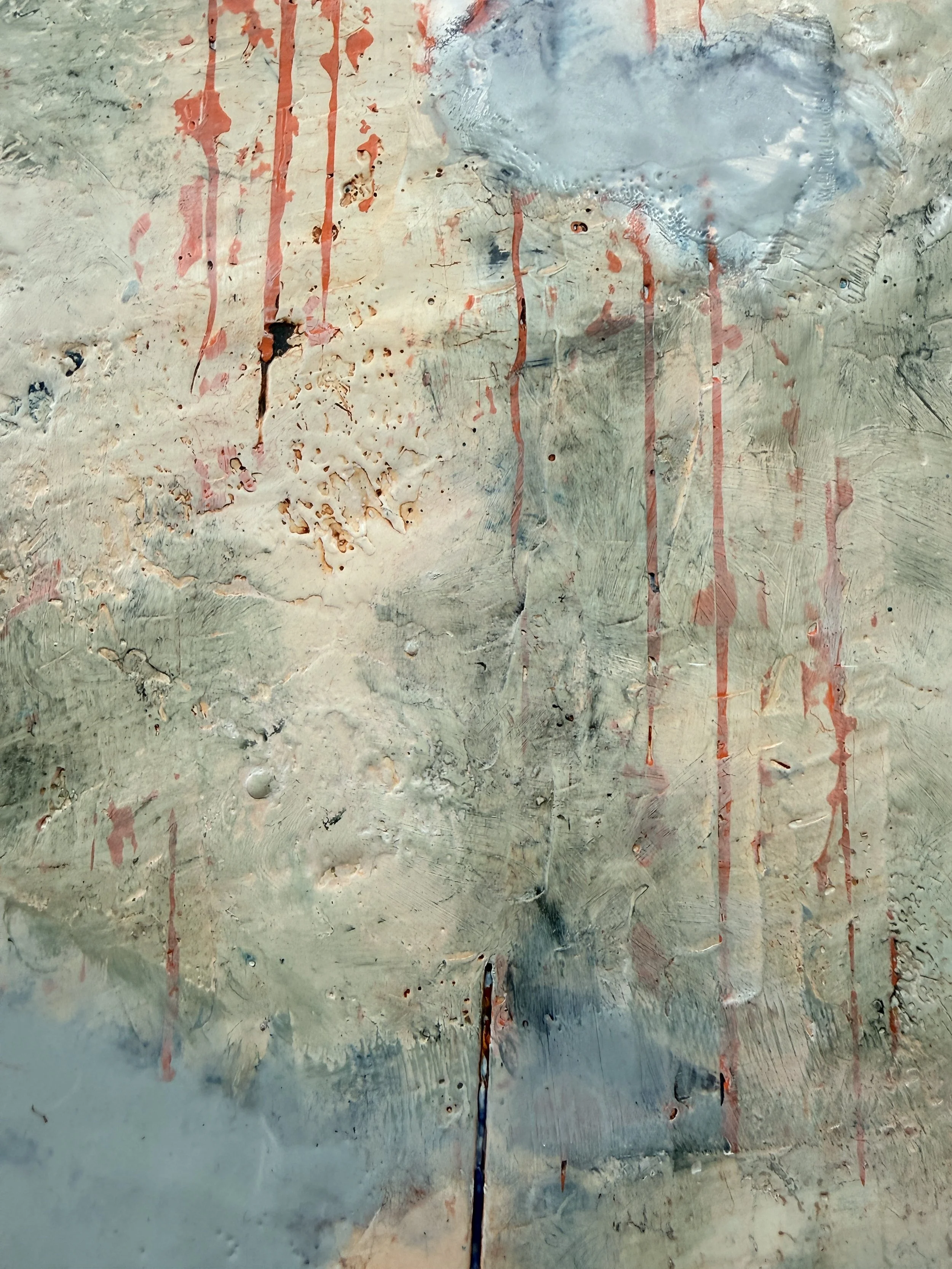 Close-up detail of Cloud Drift Atlas showing layered encaustic texture, pale blue and white pigment, shellac burn marks, rust-red drips, and mixed-media surface detail.