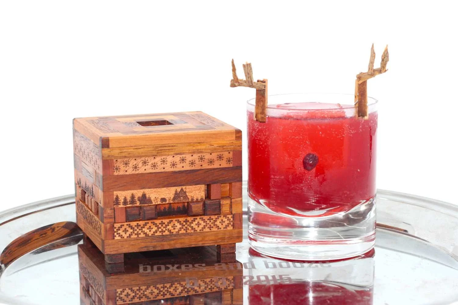 The Lost Nine puzzle box by Akhil Sudeep and Red reindeer cocktail