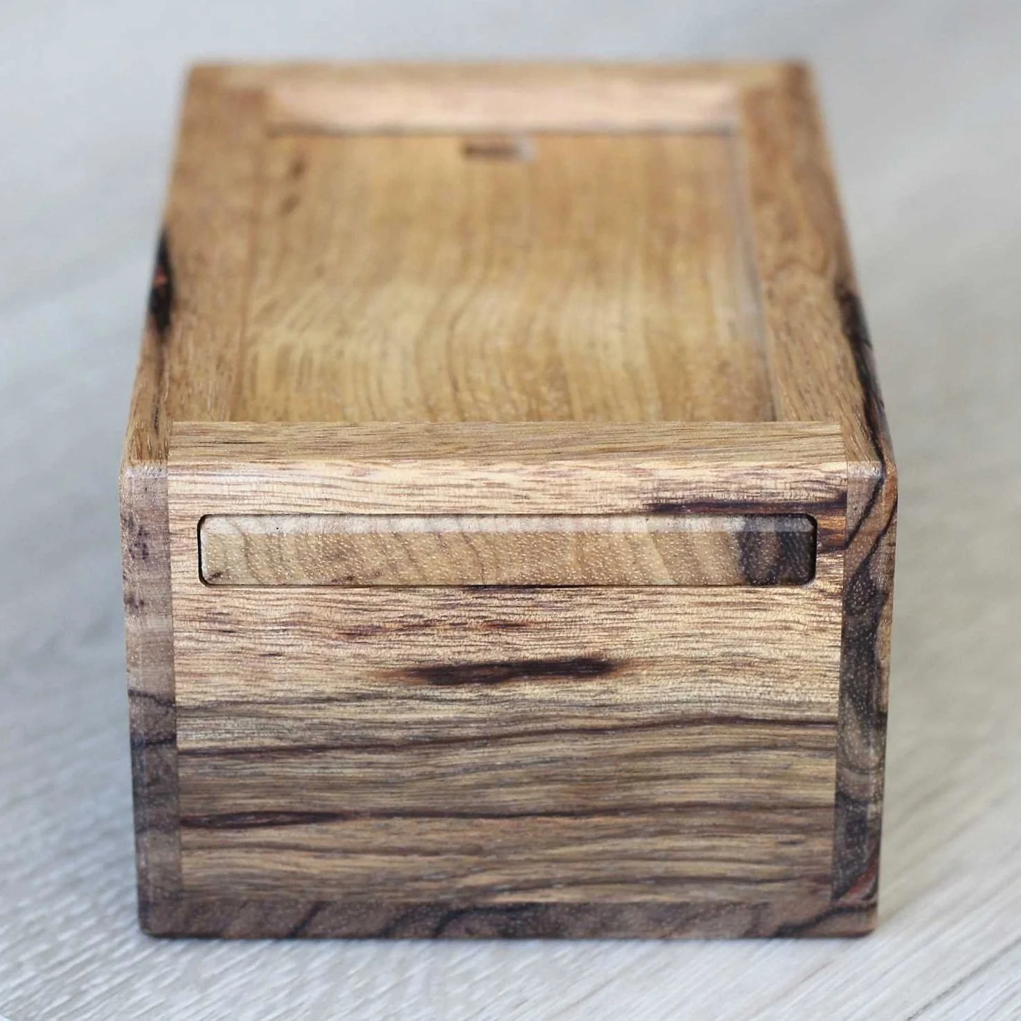 Menace puzzle box end view