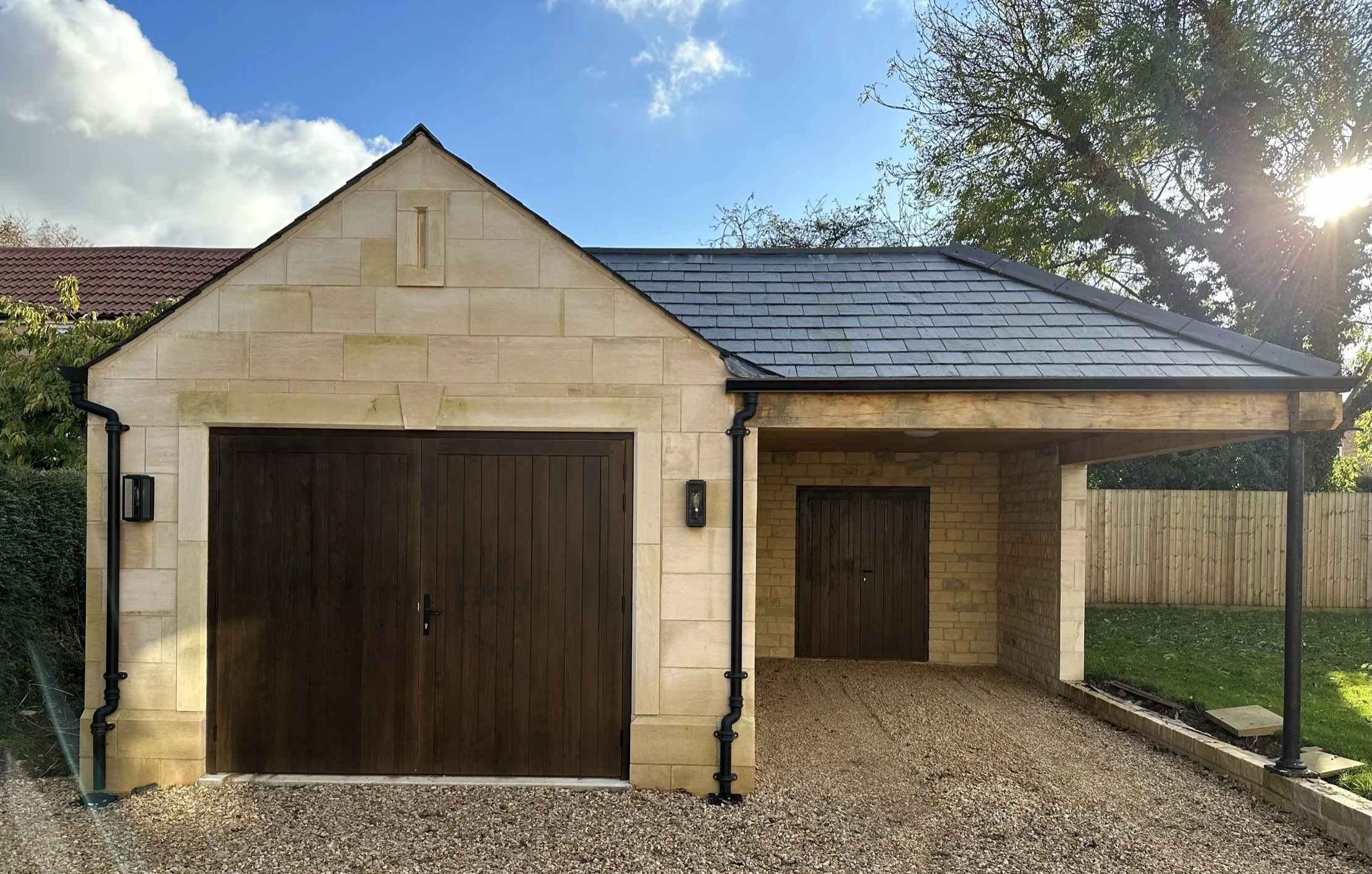 idigbo dark stain garage doors, limestone garage