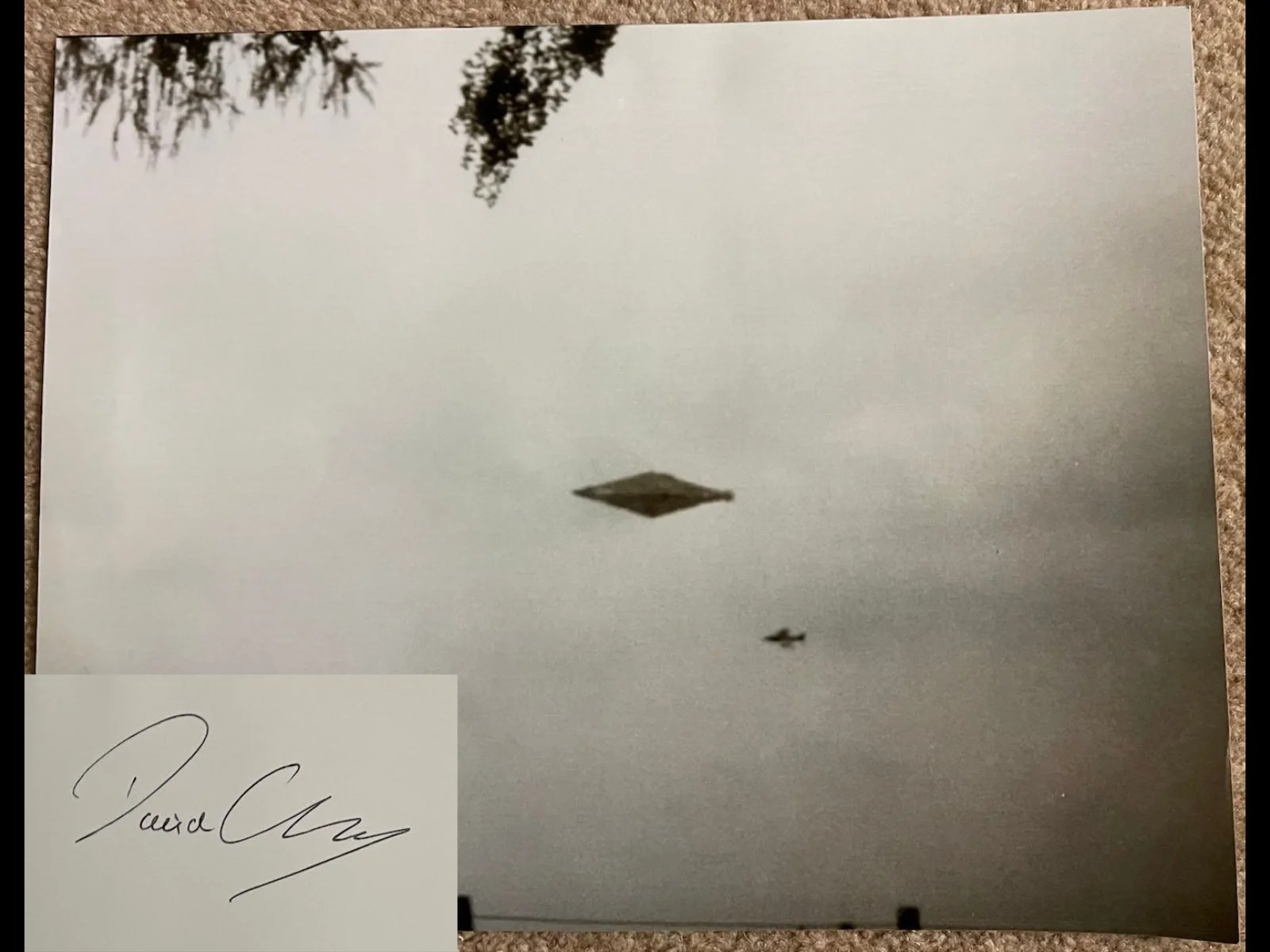 The infamous Calvine UFO photo, showing a diamond craft hovering over the Scottish highlands being buzzed by a jet