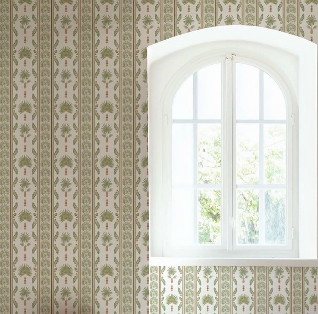 The afternoon light coming through this window makes Serenoa Stripe in Marsh feel alive &mdash; like the outdoors gently finding its way inside.

I love when a pattern brings a little bit of outside in.
#wallpaperinspo #naturewallpaper #palmettostrip