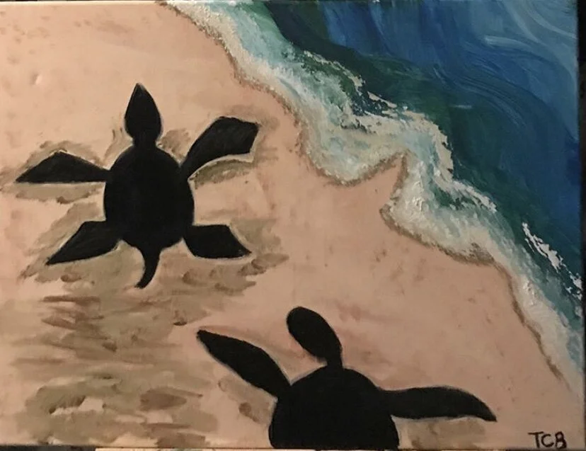 Painting of two black turtle silhouettes on a sandy beach near the ocean, with waves approaching the shore.