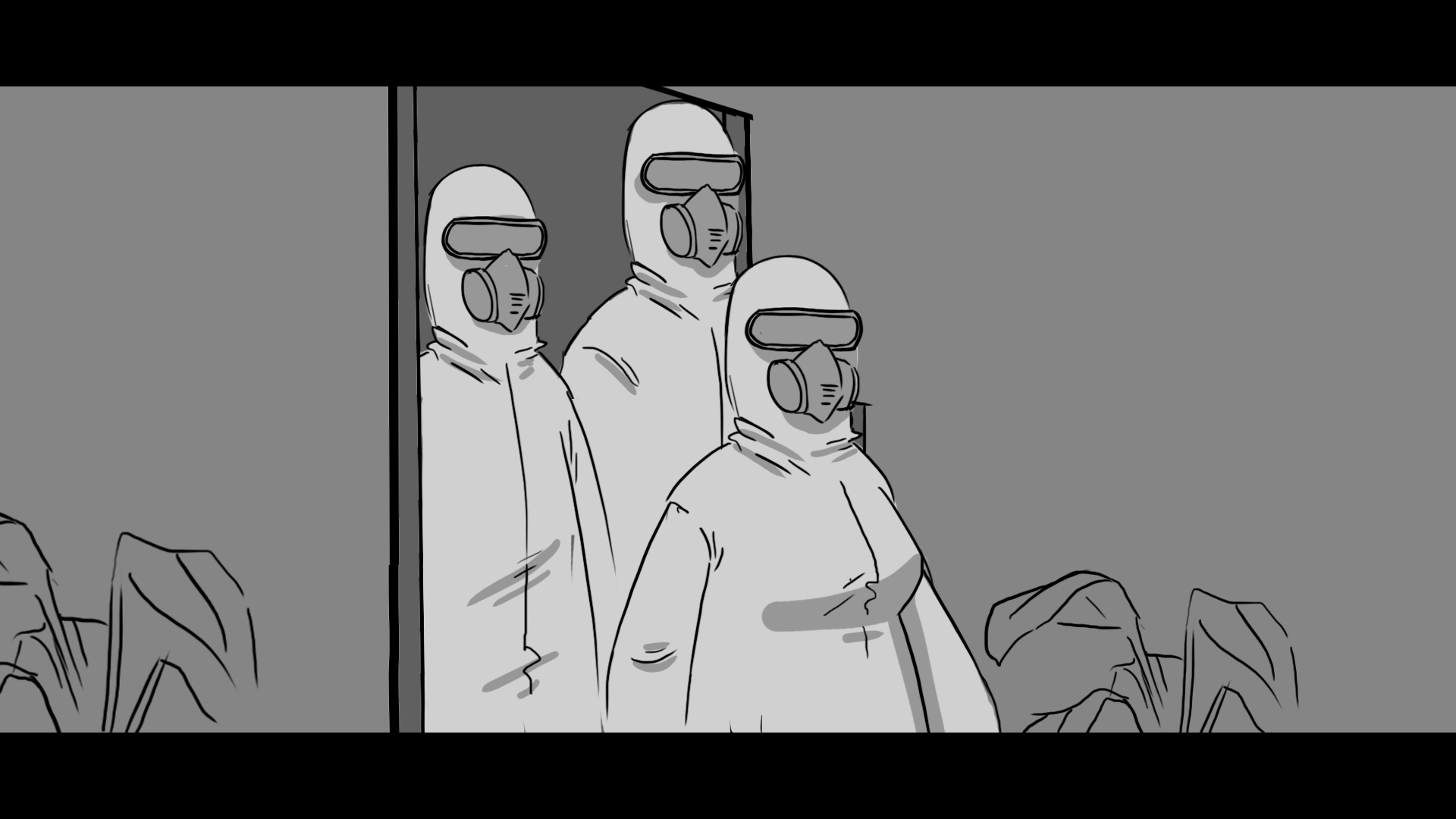Three people wearing full protective suits, masks, and goggles, standing indoors behind a wall.