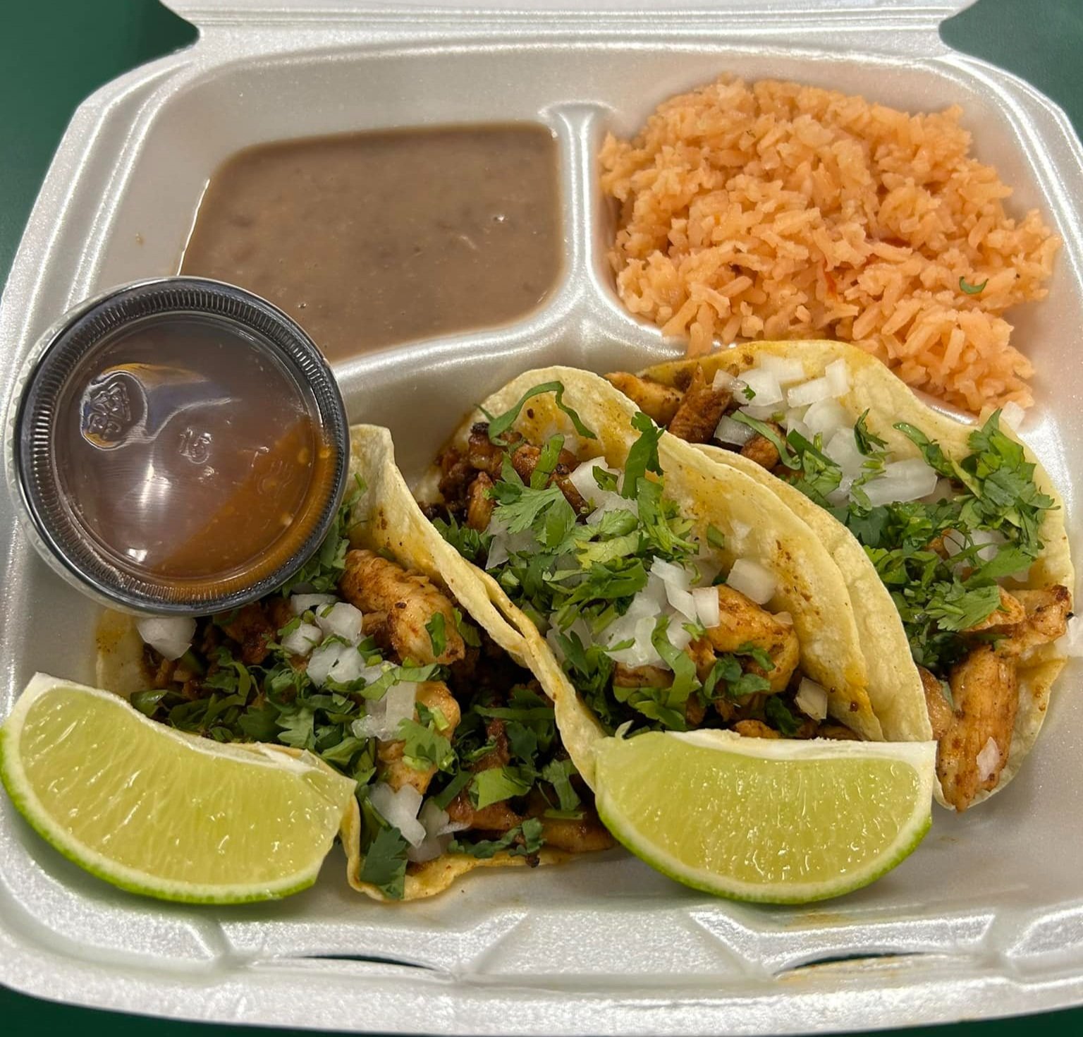 One of Sal's specials: Chicken & Chorizo Tacos with rice and beans