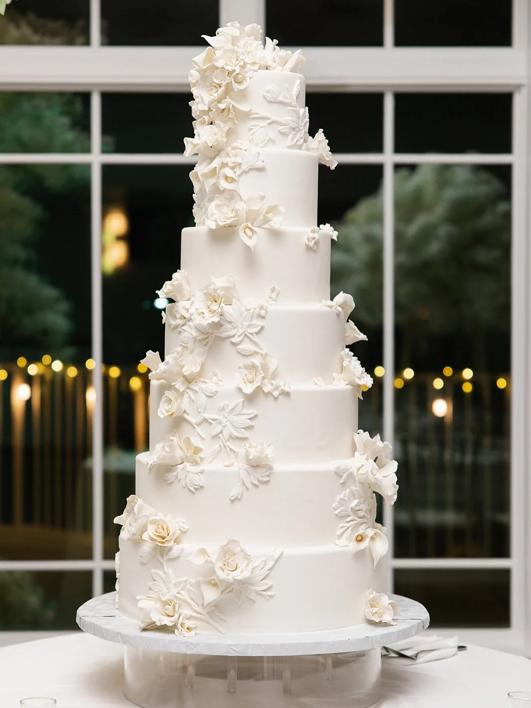 Alyssa and Bobby congratulations on your special day!
It was an honor helping Alyssa's wedding day dreams come true with an intricate 3-D fondant designs and delicate cascading flowers. Guests also enjoyed chocolate bonbon favors of dark chocolate ra