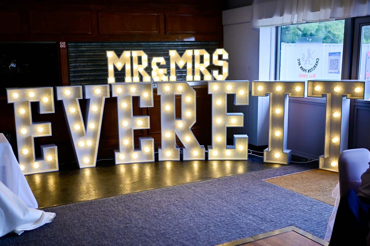  Mr. &amp; Mrs. Everett in lights from  A Little Hire .  