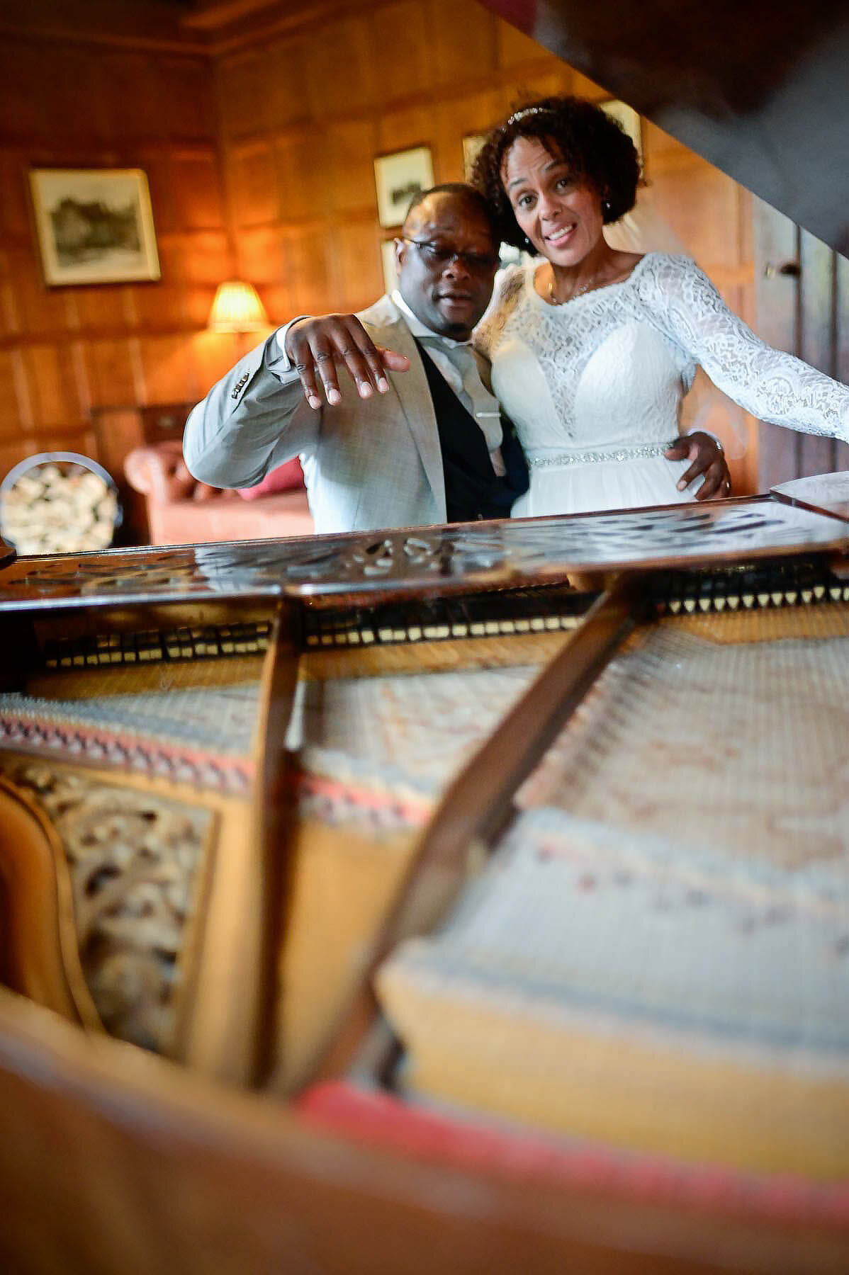 Lees-Priory-wedding-portrait-at-piano.jpg