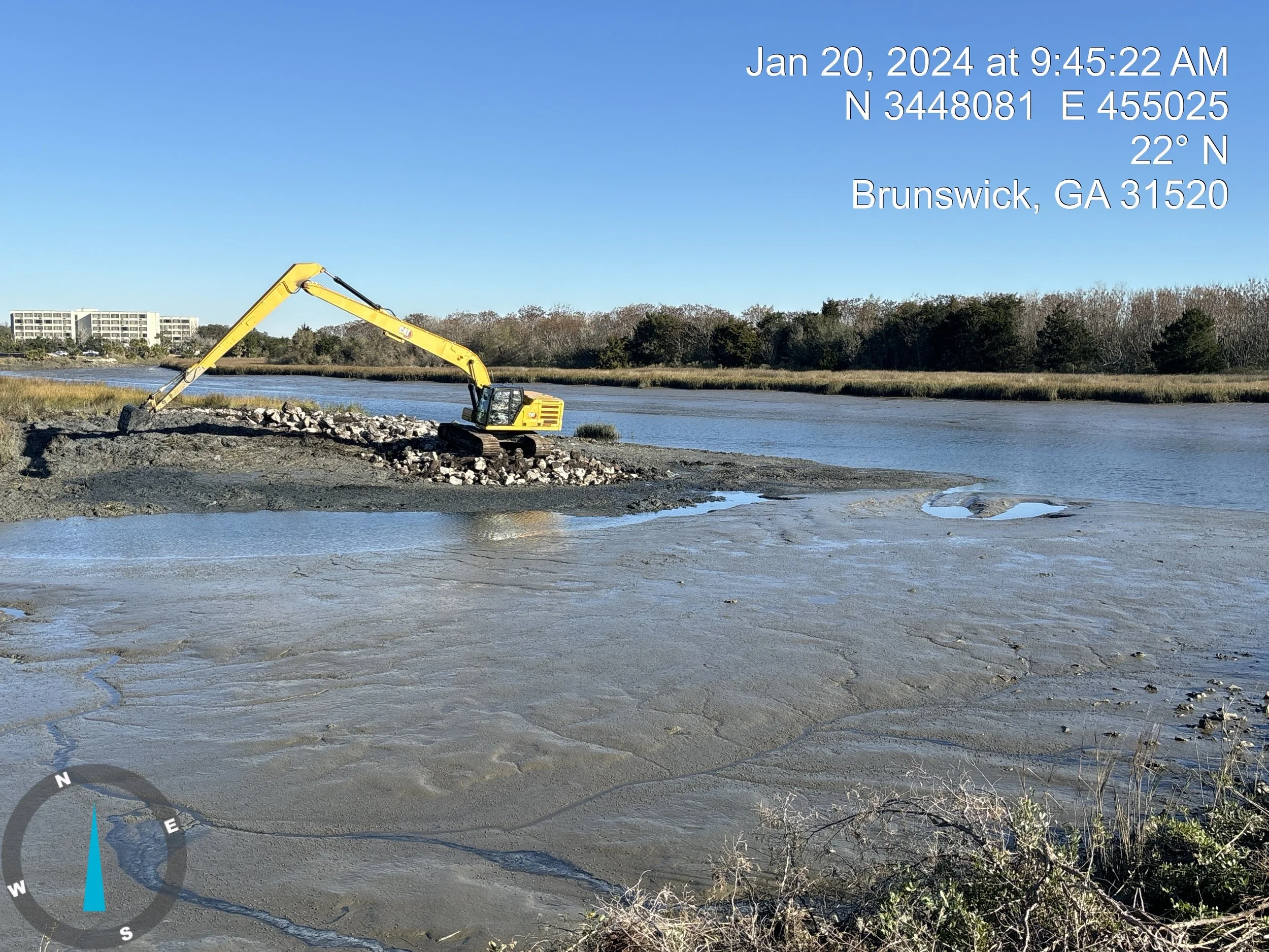Building rock dam at Dupree Creek