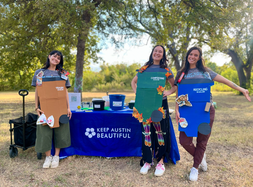 Keep Austin Beautiful Logo with green and blue petals