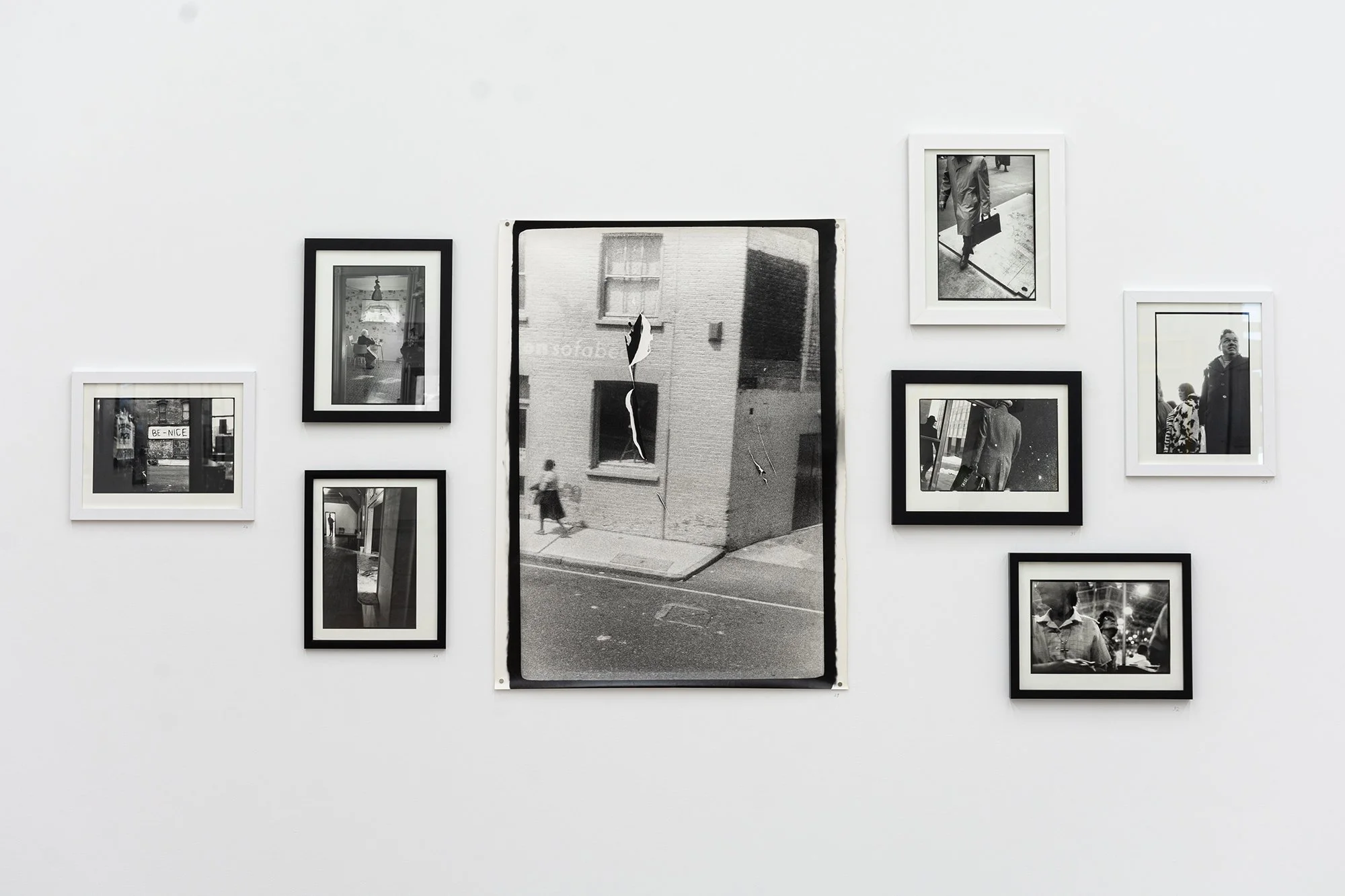 Tim Brennan.  Photographs . Installation view. Centre:  London , 1983. Black and white photograph. 76.2 x 101.6 cm.