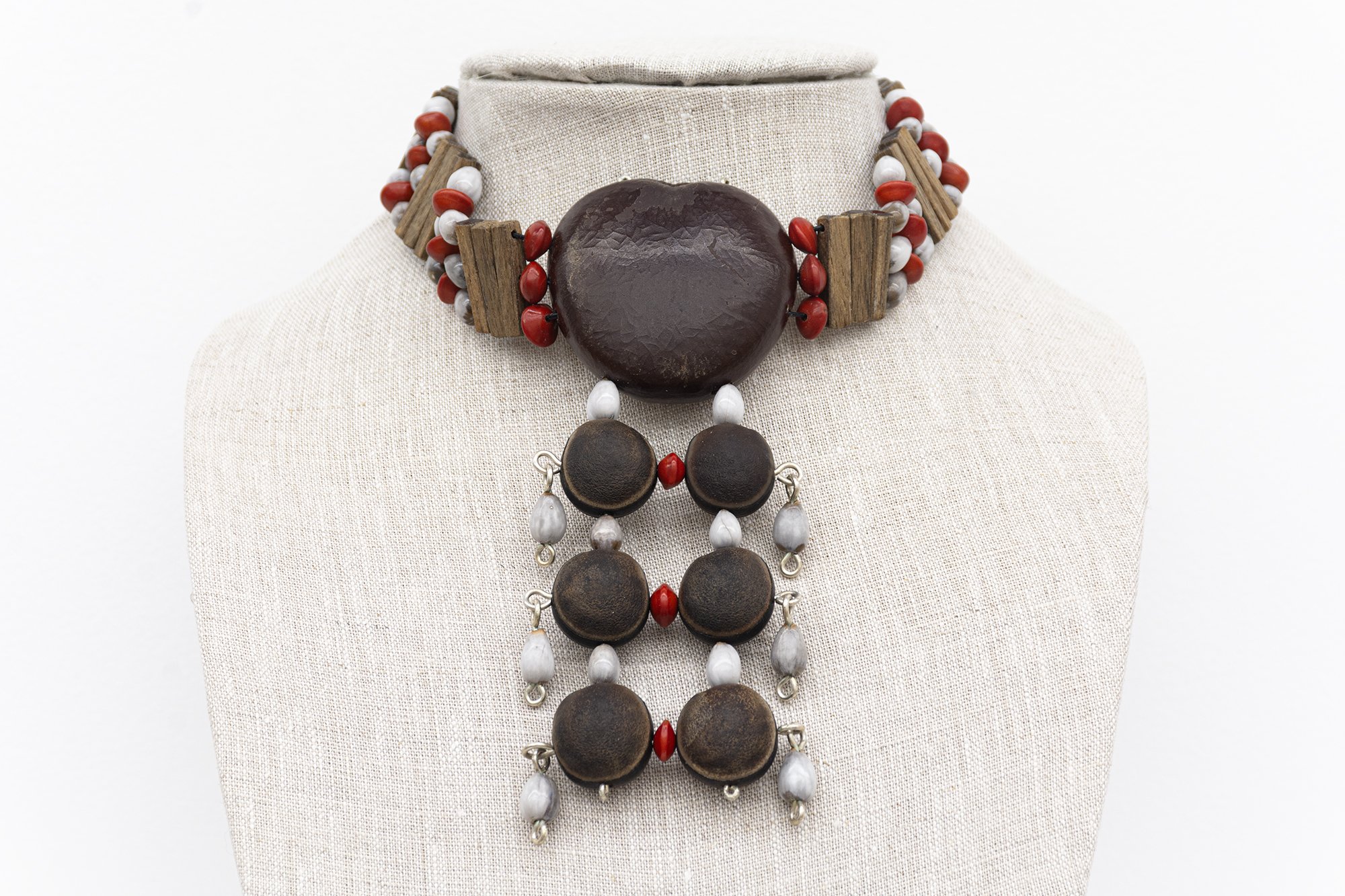 Tyshan Wright,   Carry Me   2026. Maroon beads, wire.