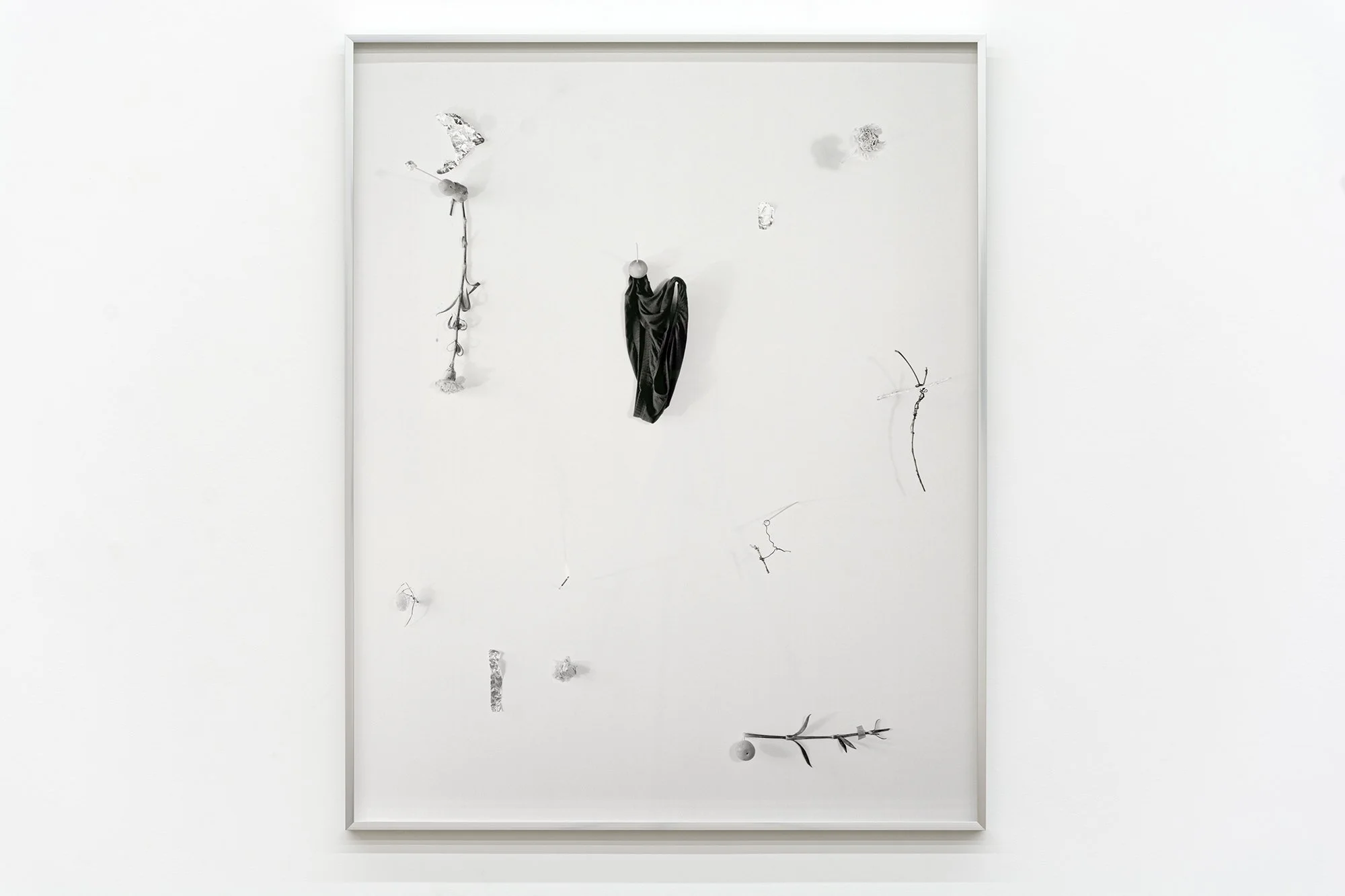B. Brookbank   Tin foil, briefs, florals, fire,   2025. Archival inkjet print. Edition 1/3. 