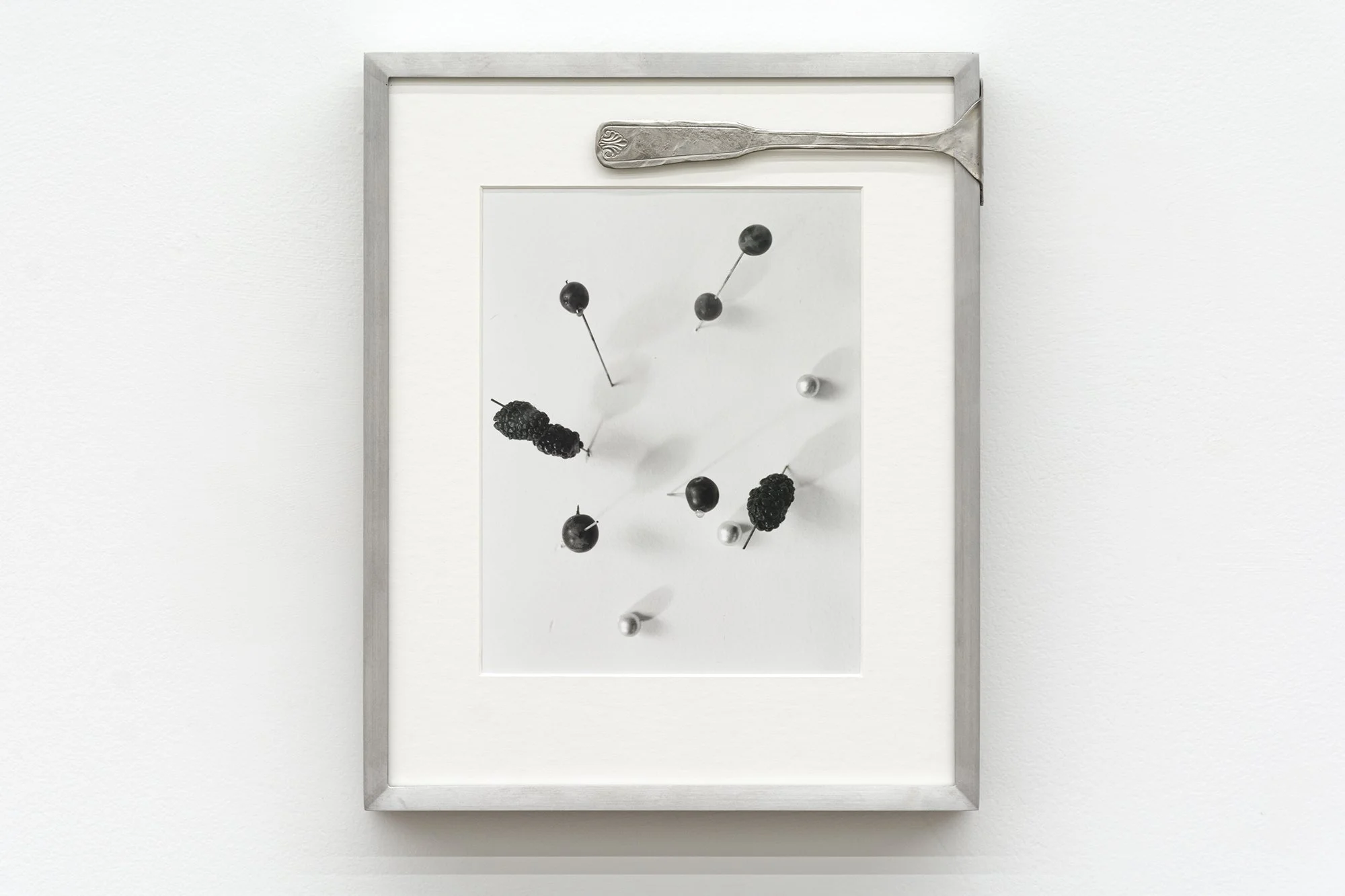 B. Brookbank   Berries,   2026. Silver gelatin contact print, hammered spoon. Edition 1/3. 