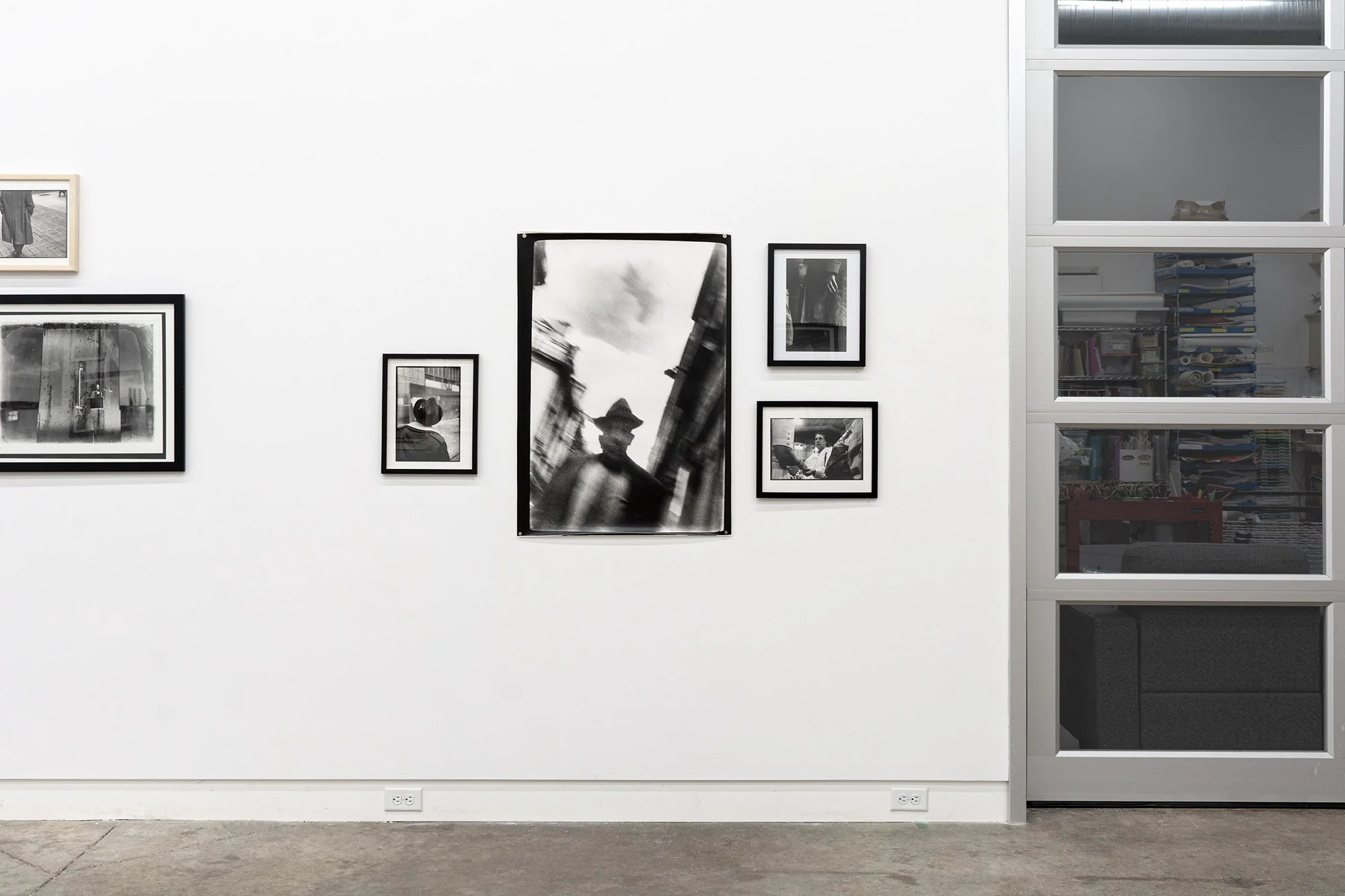 Tim Brennan.  Photographs . Installation view.