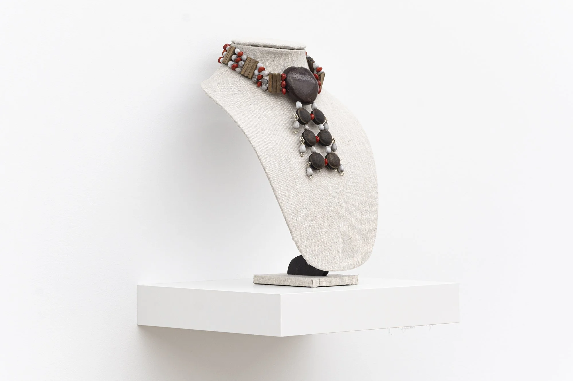 Tyshan Wright,   Carry Me   2026. Maroon beads, wire.