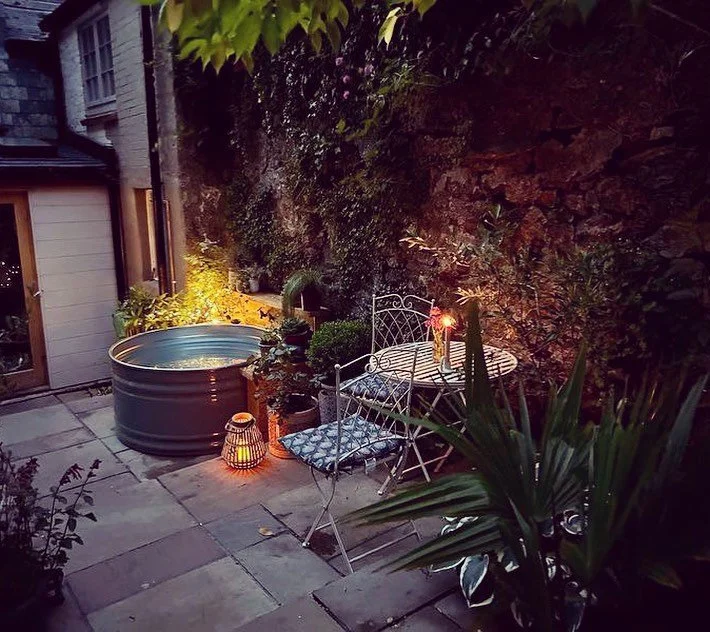 Huge thanks to our lovely customers for sharing these pictures with us. 

They have managed to create this tranquil little oasis with a 4ft round Diptank, painted in sage green. With a hot &amp; cold tap, the Diptank can be used like an outdoor bath 