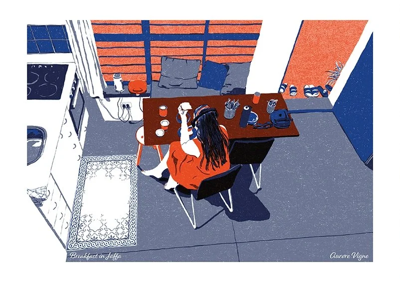 A woman is taking her breakfast in a kitchen in Yafo, Tel Aviv.