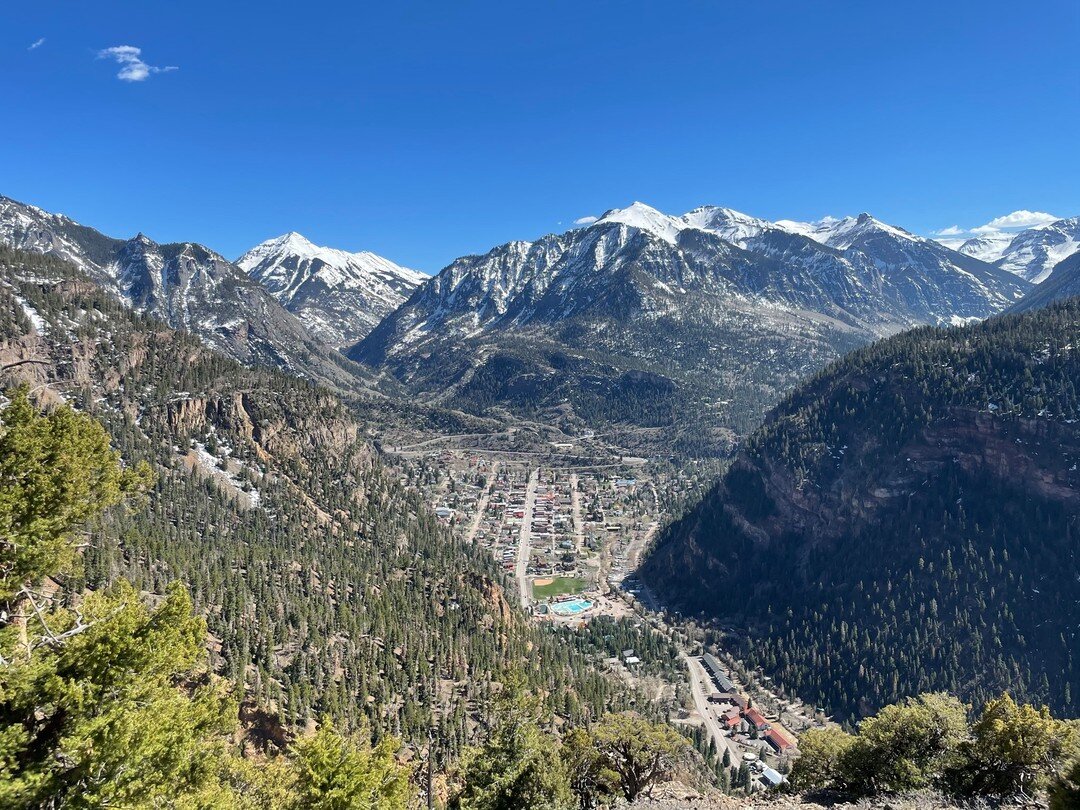 The view from our balcony at The Wilmont certainly never gets old. From the main house at 9,400' you can see all the way up into Yankee Boy basin and you can actually see through the tunnels heading south on 550. And of course, you can see the whole 