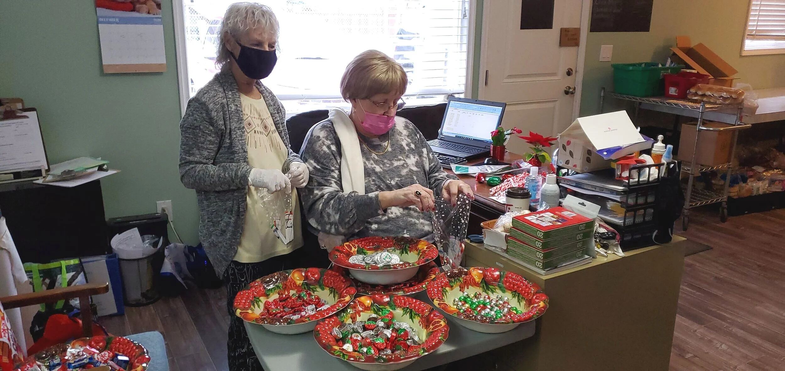Pat and Peggy making candy bags