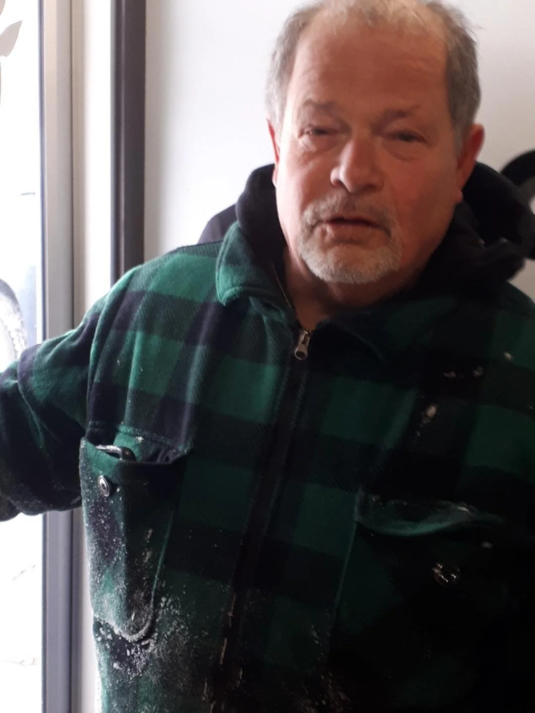 Terry helps carry boxes and bags to the cars