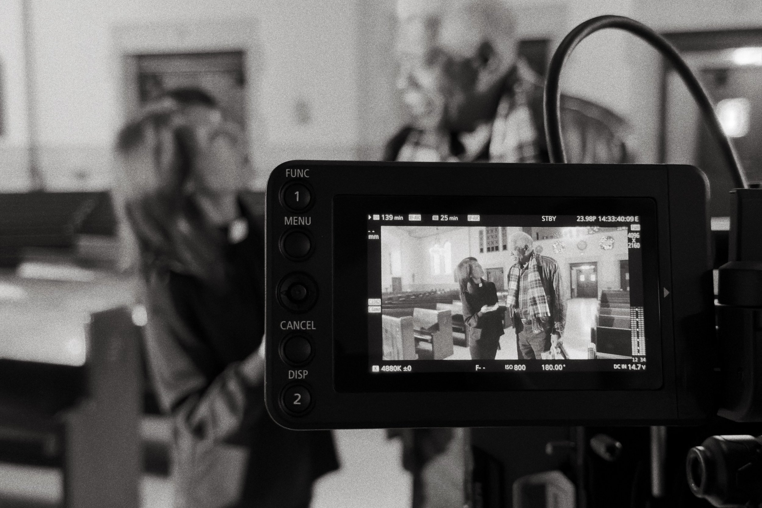 Camera monitor showing a performer during a Kai Films production.