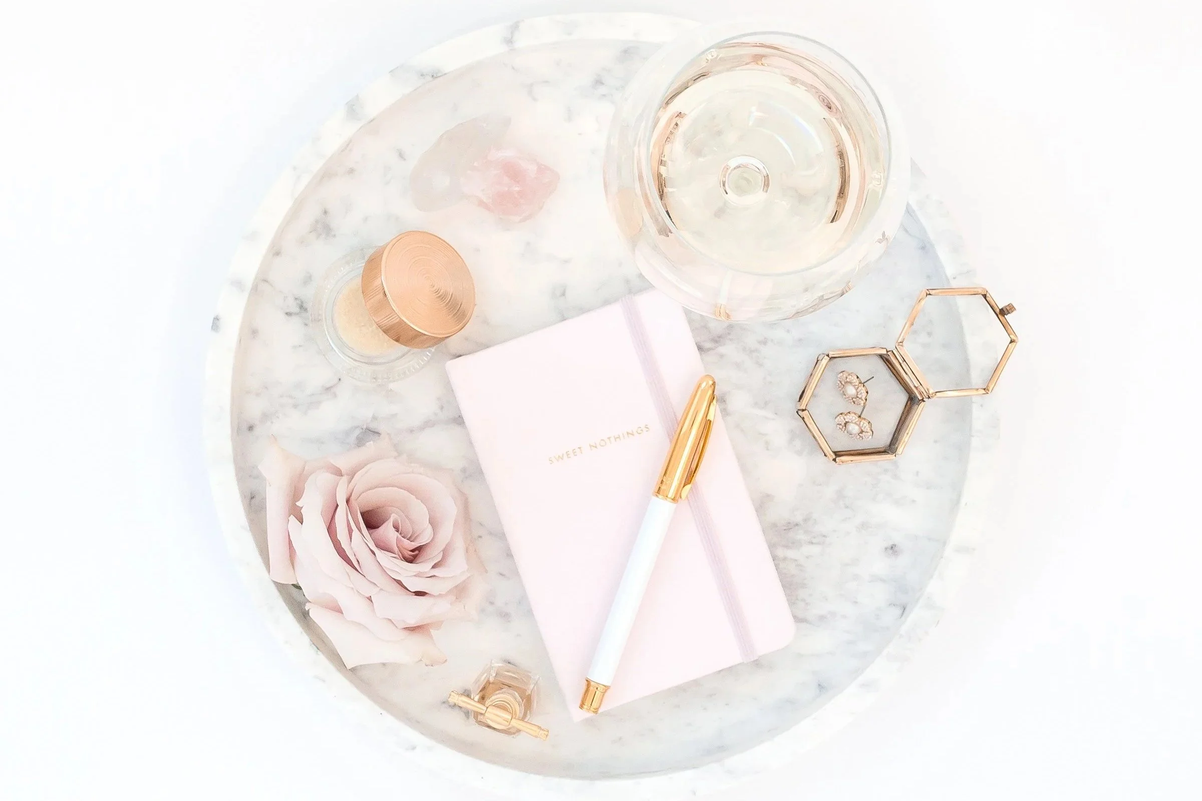 a tray of small beautiful daily objects