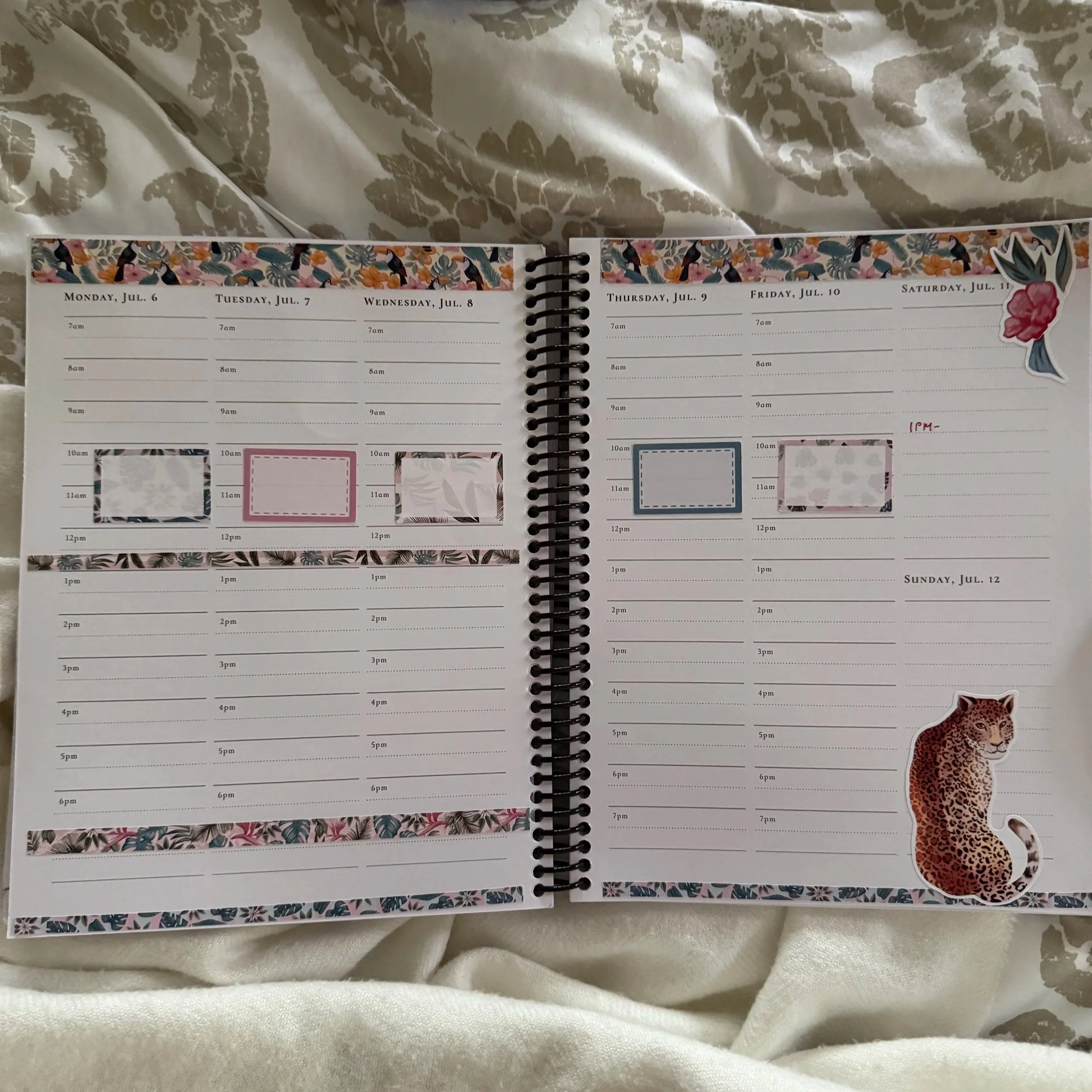 a weekly spread in the lynx point creative planner decorated with jungle themed stickers from mama gloria planner sticker company