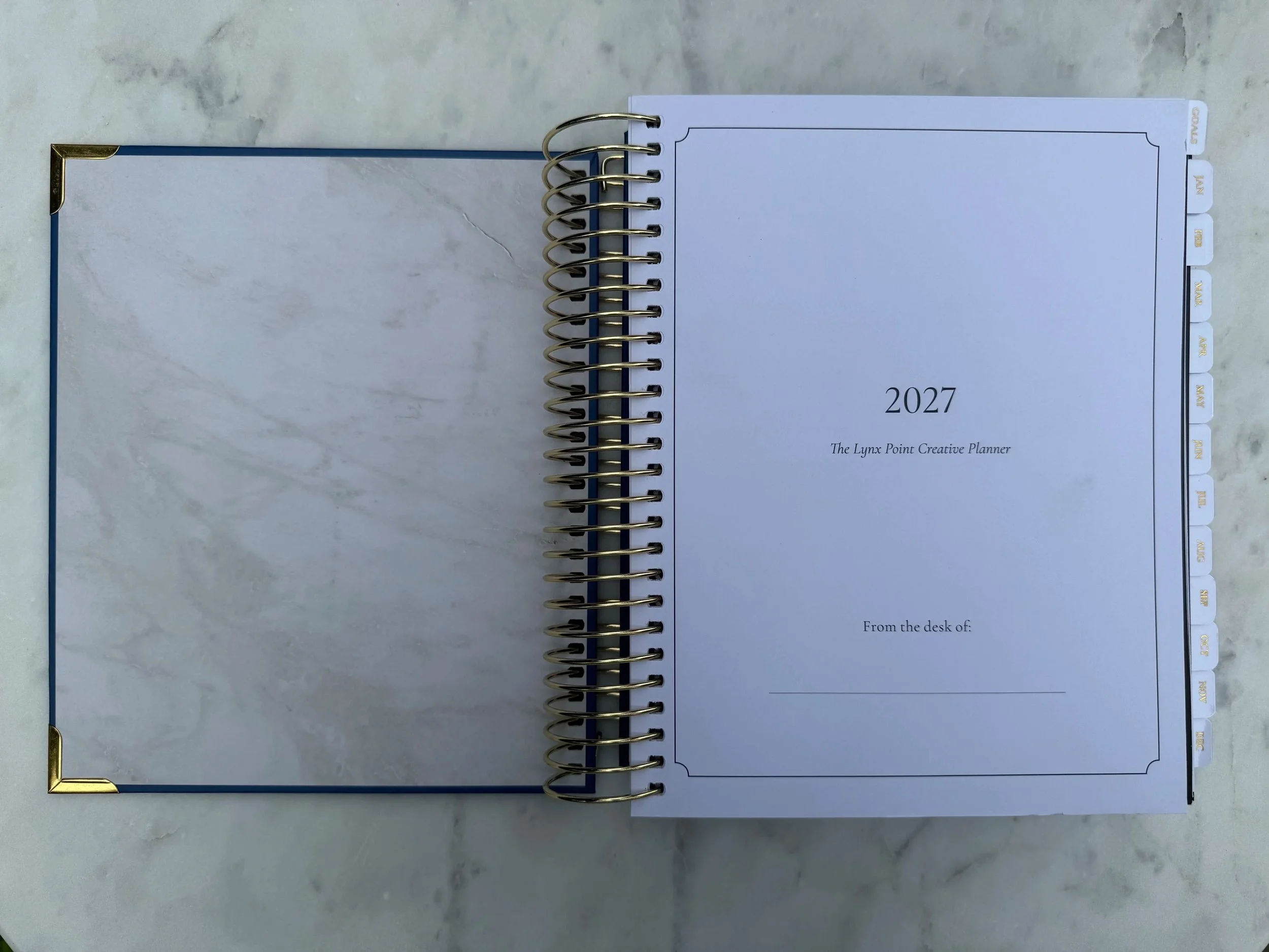 Lynx-Point-2027-Planner-Blue-and-white-gilded-cover-inside