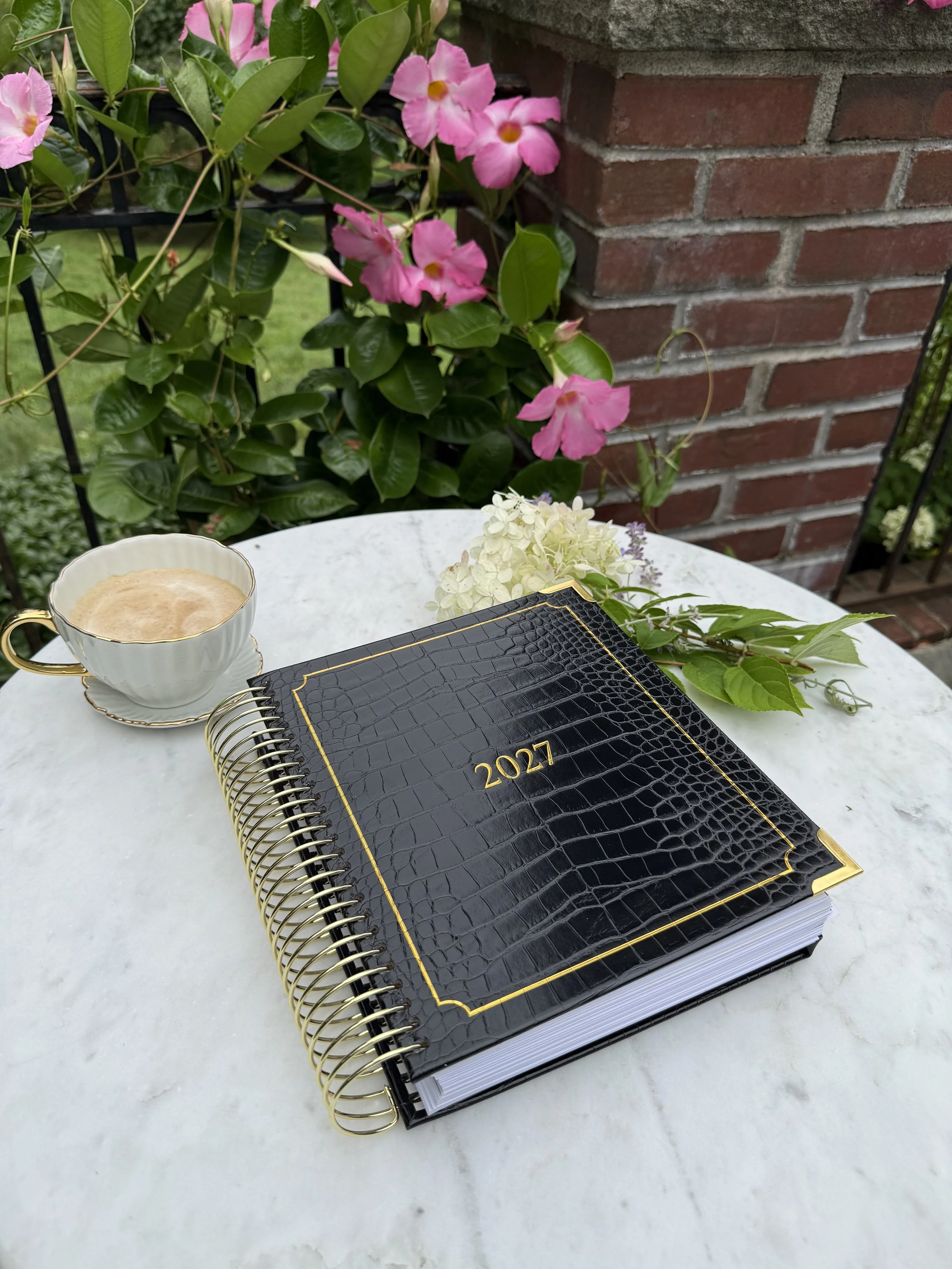 Lynx-Point-Planner-2027-Black-Croc-Vegan-Leather-on-bistro-table
