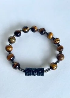 9" eye of the tiger glass stone with wooden spacer