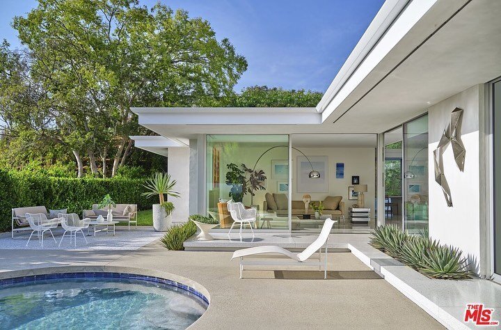 For sale | An immaculate 90210 Mid Century gem with a perfect kidney pool overlooking treetop views. Featured on the cover of @elledecor | Message for private showing. 

Listed by: Drew Fenton