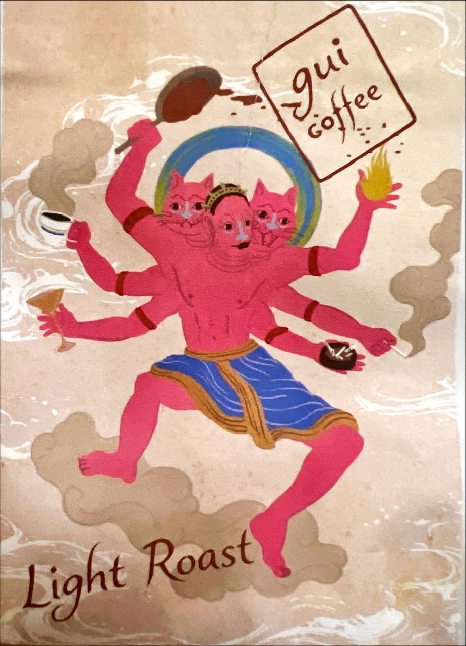 A colorful illustration of a multi-armed, pink Hindu deity-like figure holding a coffee cup, a smoking pipe, a cocktail glass, and a flame, with a cartoonish face and a sign that says "güi coffee." The words "Light Roast" are at the bottom of the image.
