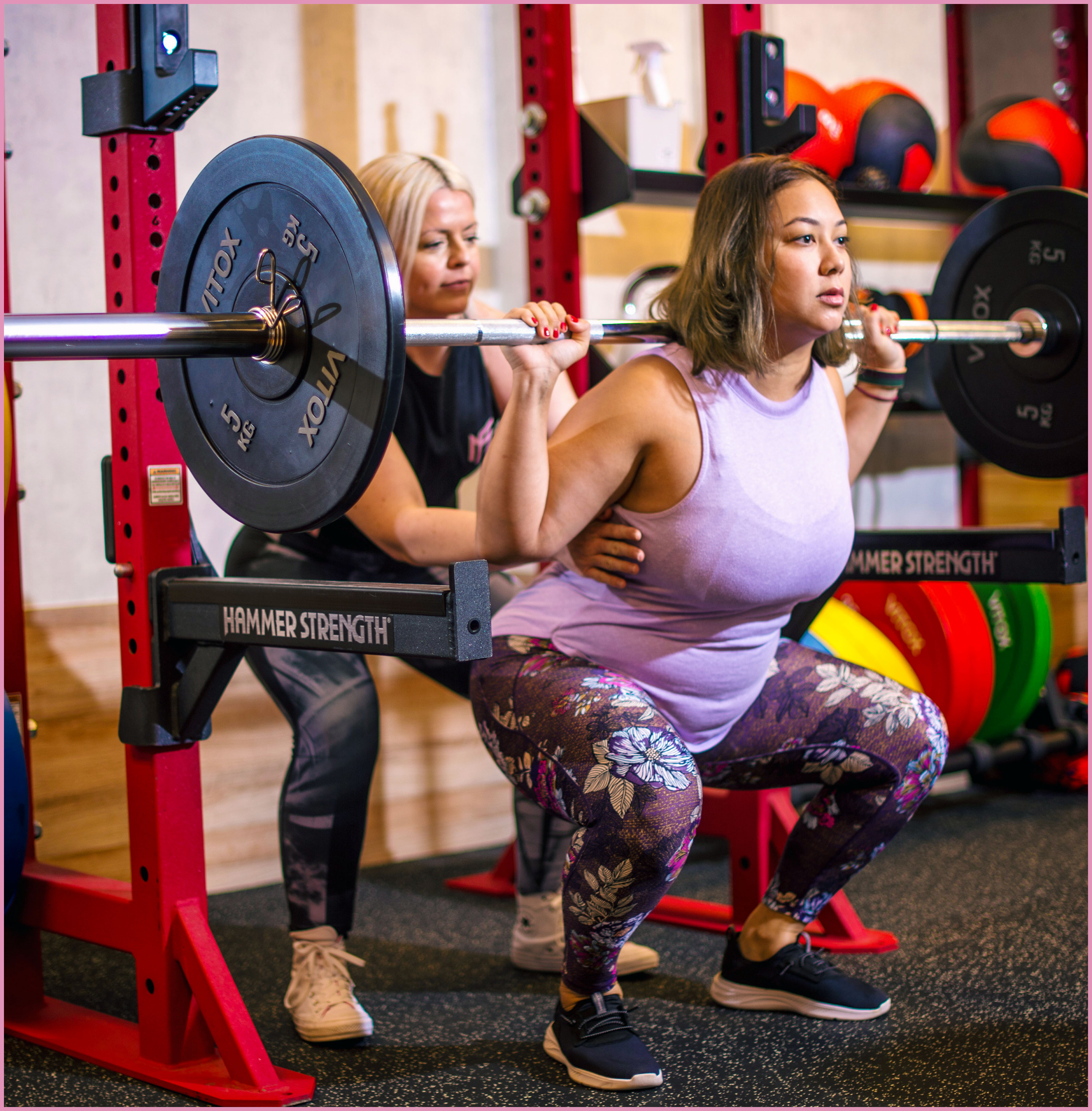 Personal training squat session at MSFIT women-only gym in Singapore with Britteny