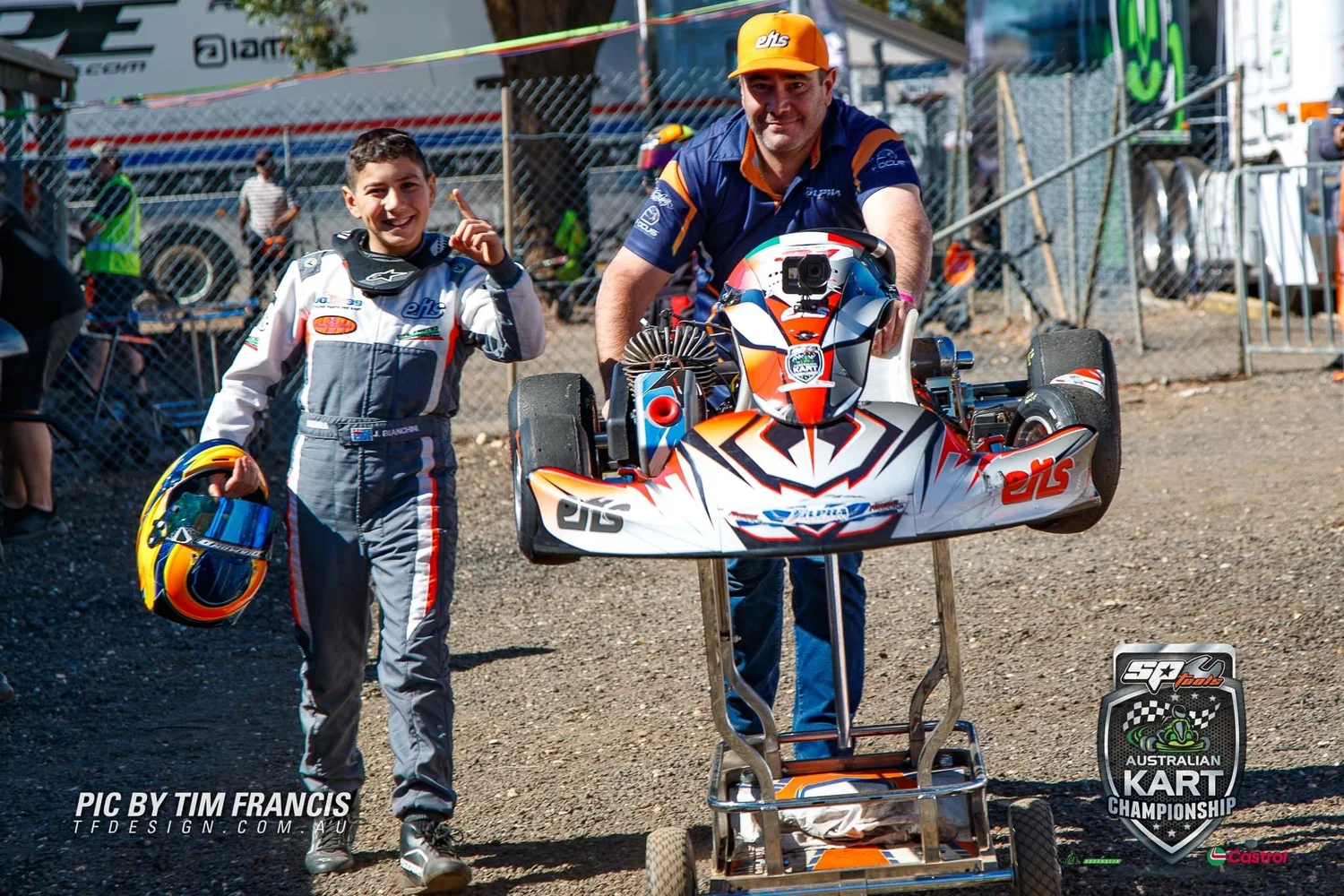 Alpha Motorsport drivers and mechanic celebrating pole position