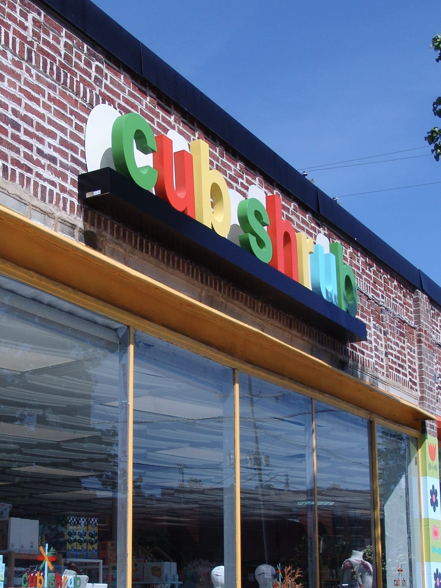 Multicolor letter set reading "Cub Shrub" mounted to a building. Created by Brite Line Signs in Columbus, Ohio