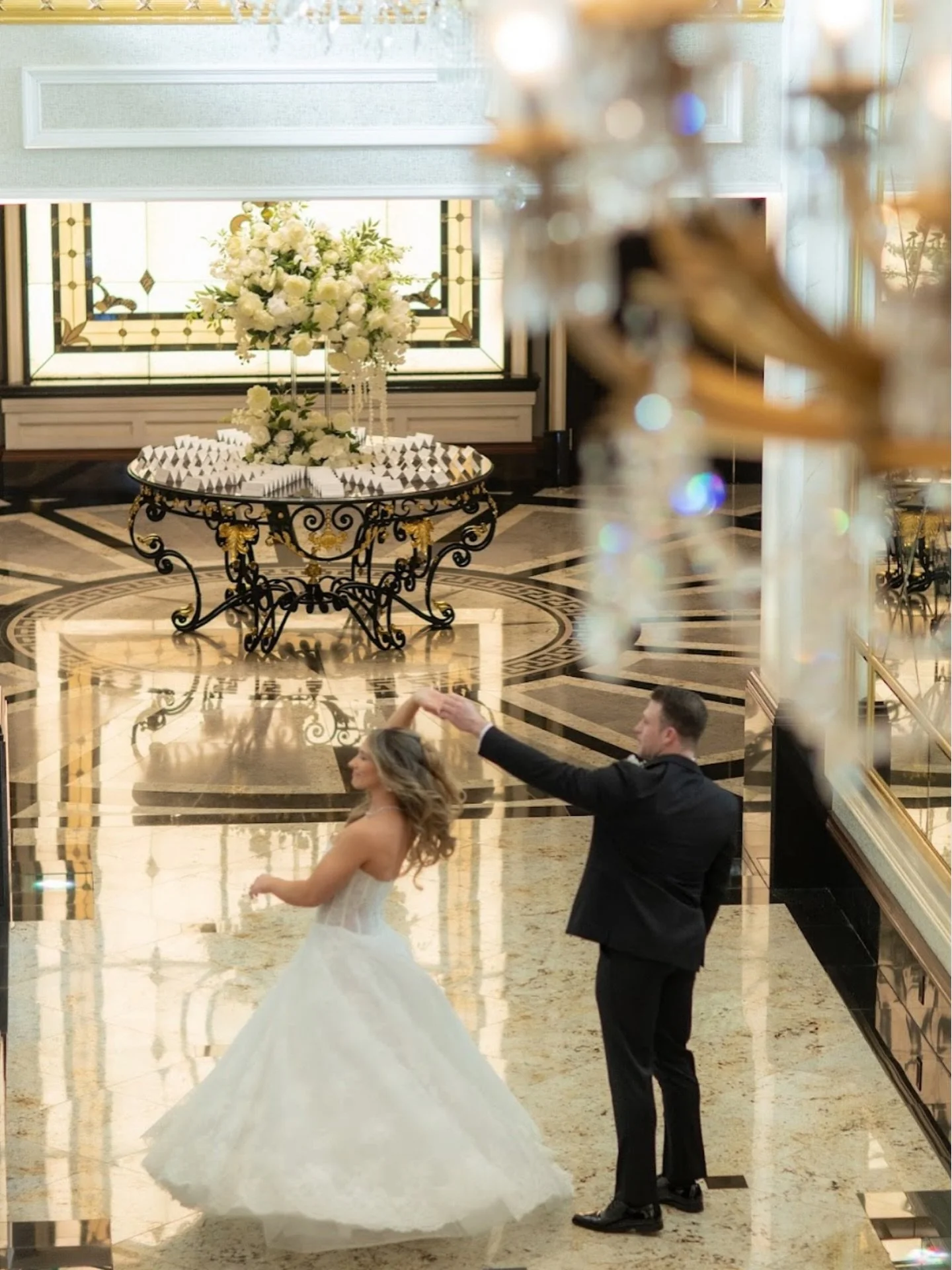 Every twirl deserves a backdrop this dreamy. White artistic blooms + golden glow = timeless magic at @shadowbrooknj 
#ShadowbrookWedding 
#ShadowbrookAtShrewsbury 
#ShadowbrookBride 
#ShadowbrookNJ 
#ShadowbrookEvents 
#LuxuryWeddingFlorist 
#NJWedd