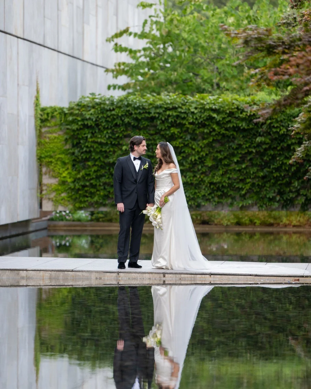 Name a better combo than orchids and calla lilies? We'll wait!

C + R's bridal bouquet pairs sculptural calla lilies with delicate white orchids, creating a look that feels timeless, refined, and effortlessly romantic. The perfect finishing touch for
