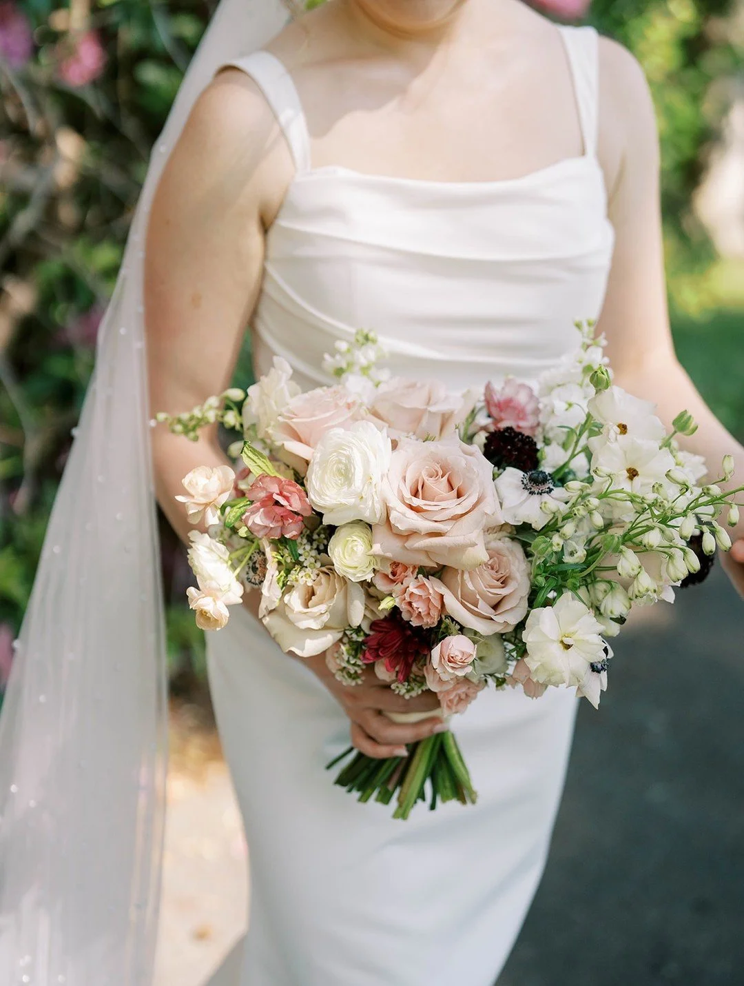 As spring approaches, a bouquet that feels like it was gathered straight from the garden.

Blush roses, creamy ranunculus, delicate white blooms, and soft pops of color. Designed for A + S to feel romantic, natural, and beautifully timeless in the br