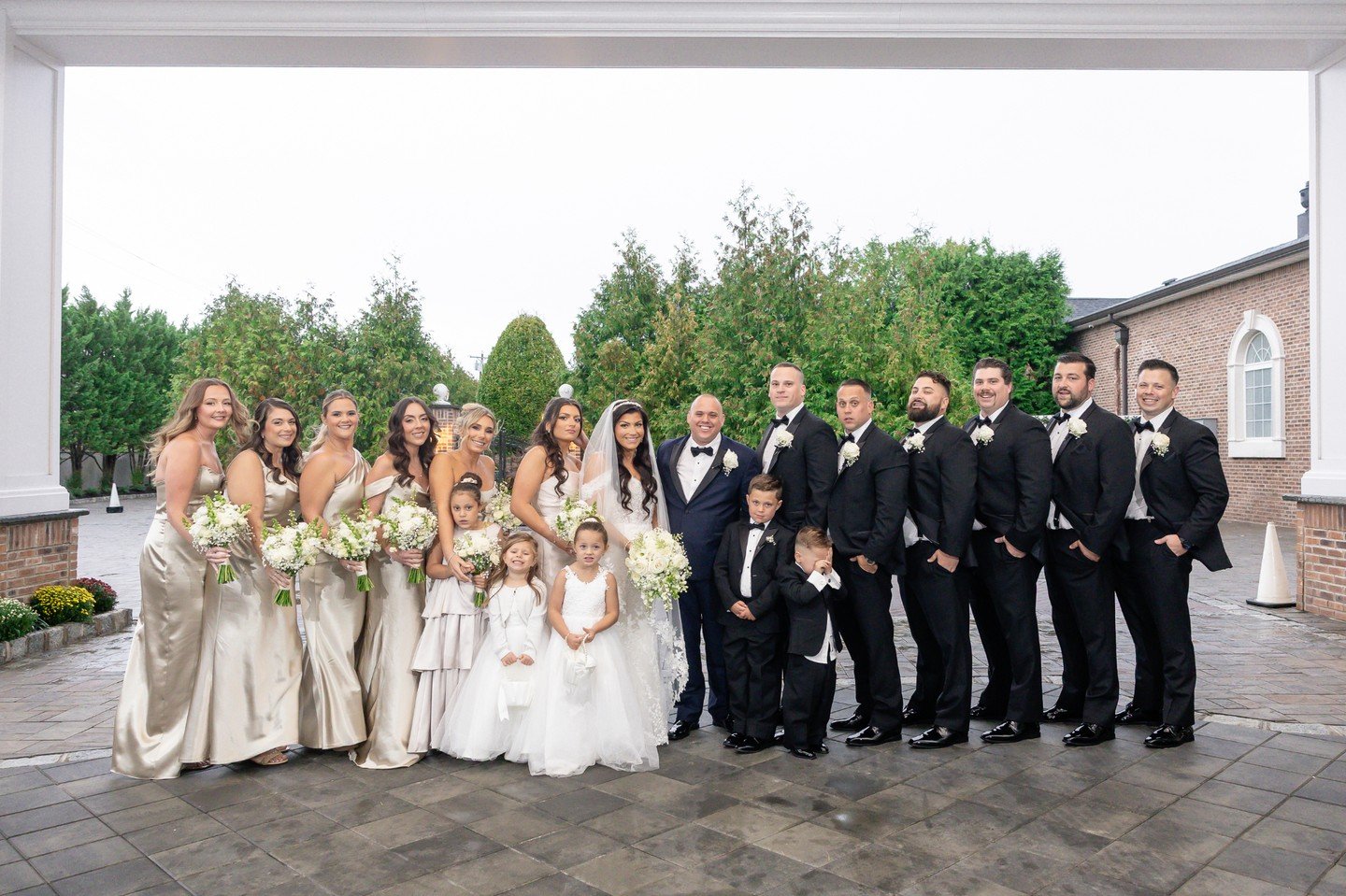 J + C's wedding at The Rockleigh deserved nothing but the best: a luxury cascading bridal bouquet, lush white bridesmaids' bouquets, and classic white rose boutonnieres for the boys.

Nothing says "timeless wedding" like artfully designed p